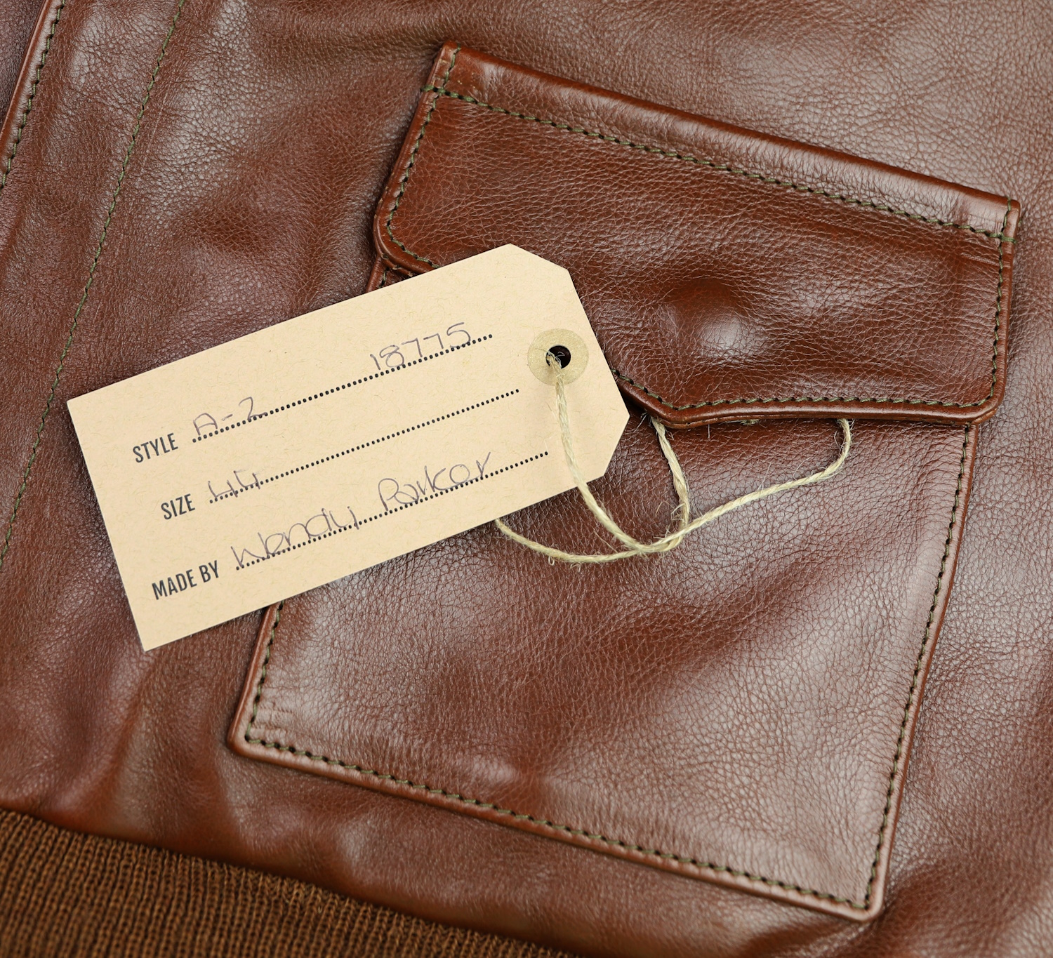 Aero 18775 A-2 Russet Vicenza Horsehide U3B name tag.jpg