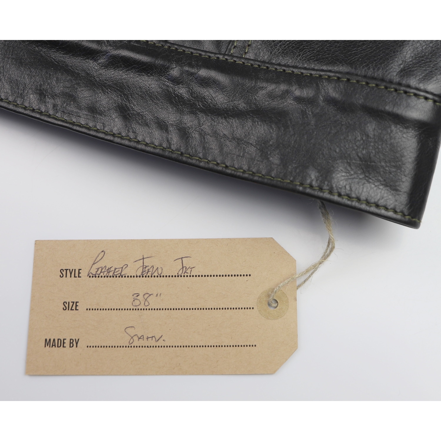 Aero 557XX Jean Jacket Blackened Brown Vicenza SB7 name tag IG square.jpg