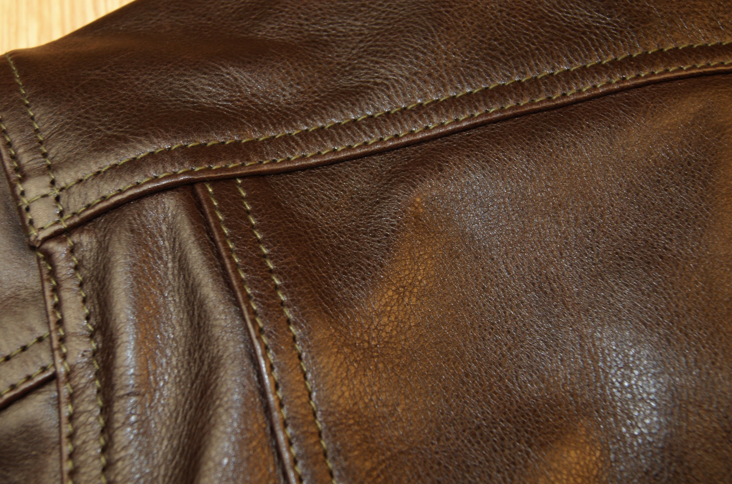 Aero 557XX Type 3 Dark Seal Vicenza Horsehide CAM back stitching.jpg