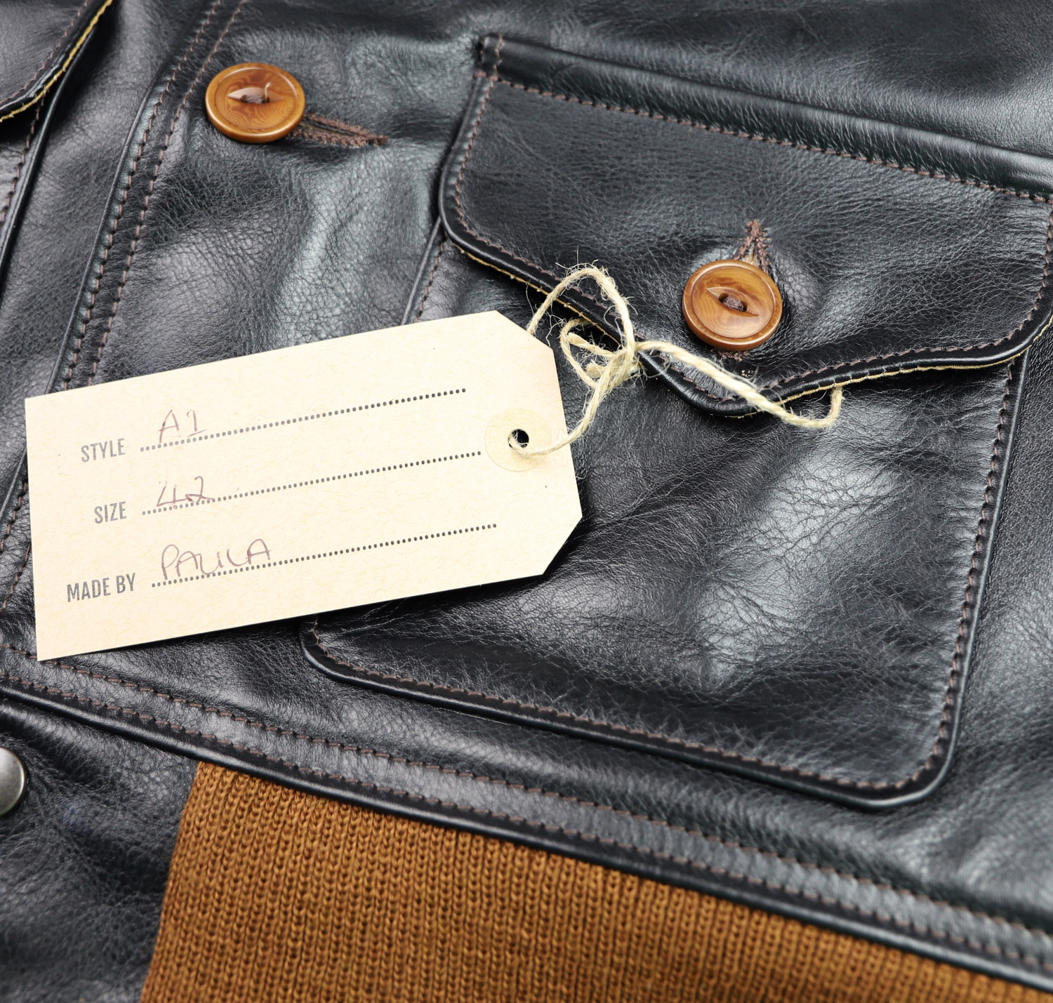 Aero A-1 Blackened Brown Vicenza Horsehide EDB6 name tag.jpg