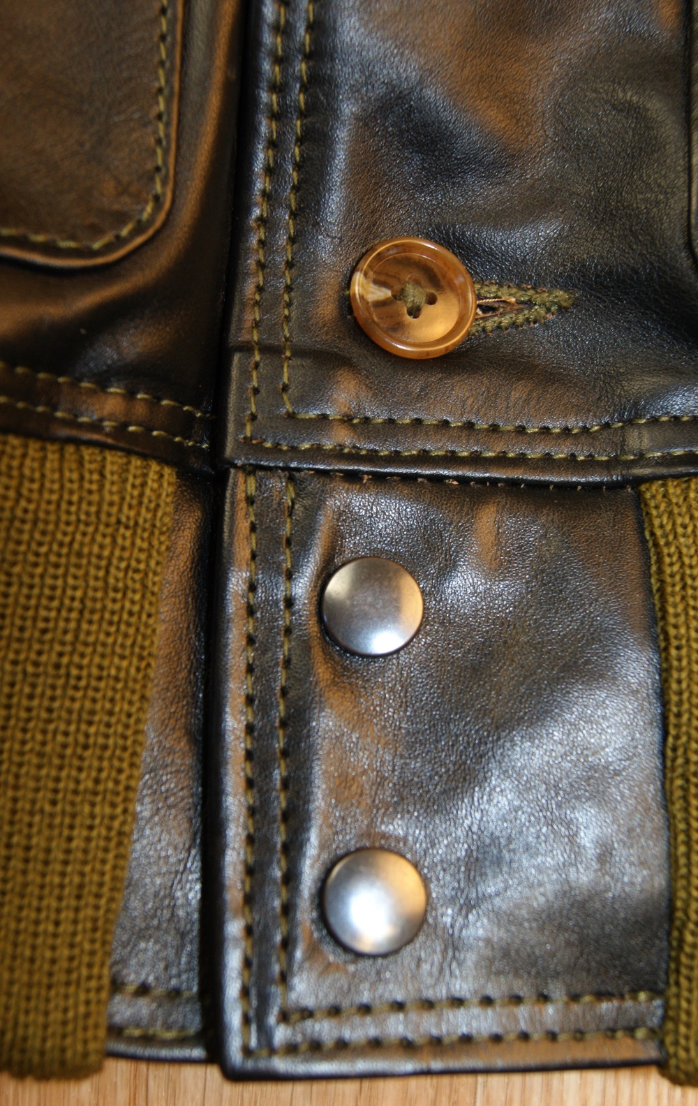 Aero A-1 Blackened Brown Vicenza Horsehide KJX bottom snaps.jpg