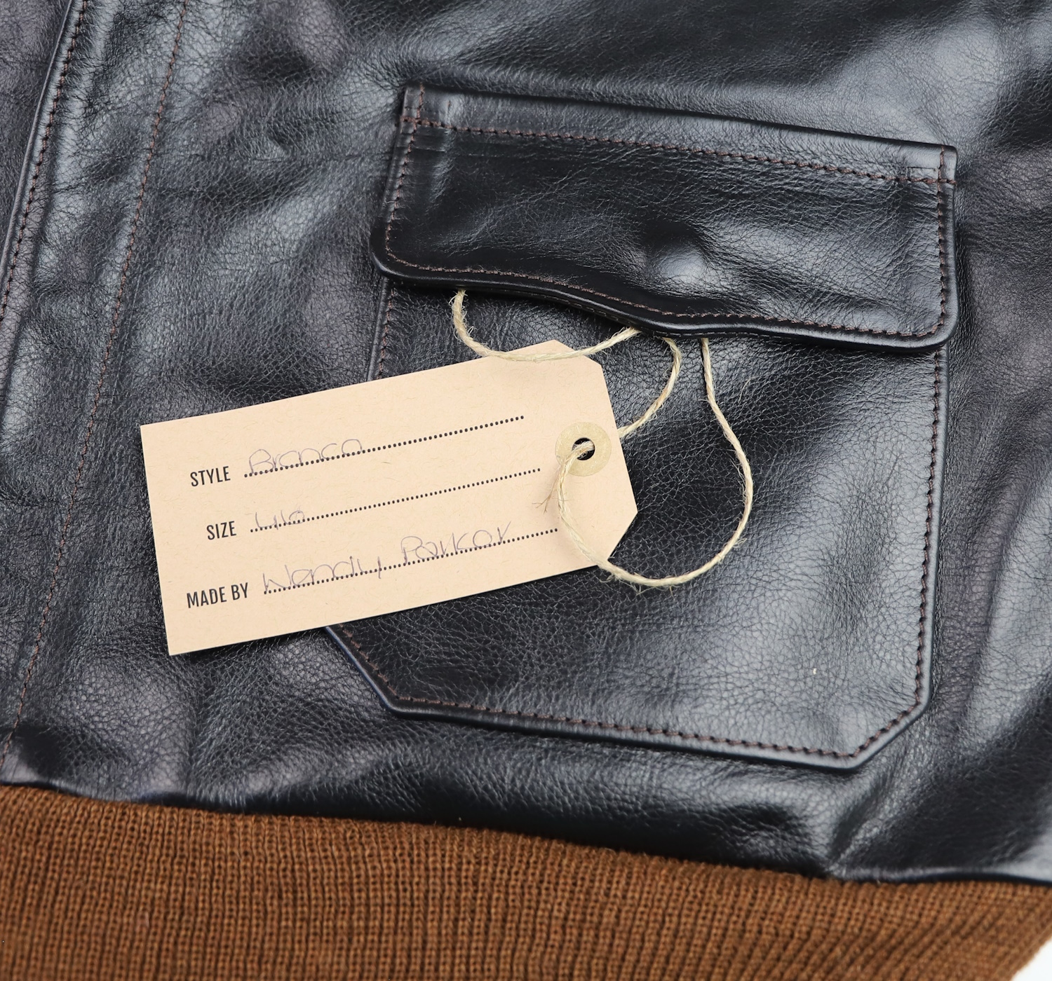 Aero A-2 Bronco Blackened Brown Vicenza Horsehide UN7 name tag.jpg