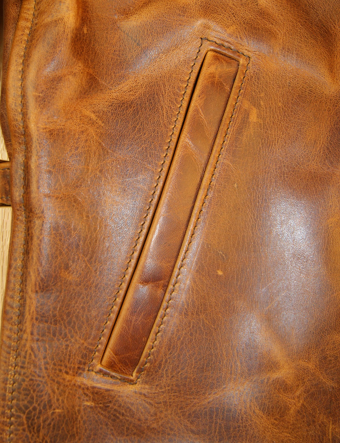 Aero August Battered Tan Horsehide BW22 handwarmer pocket.jpg