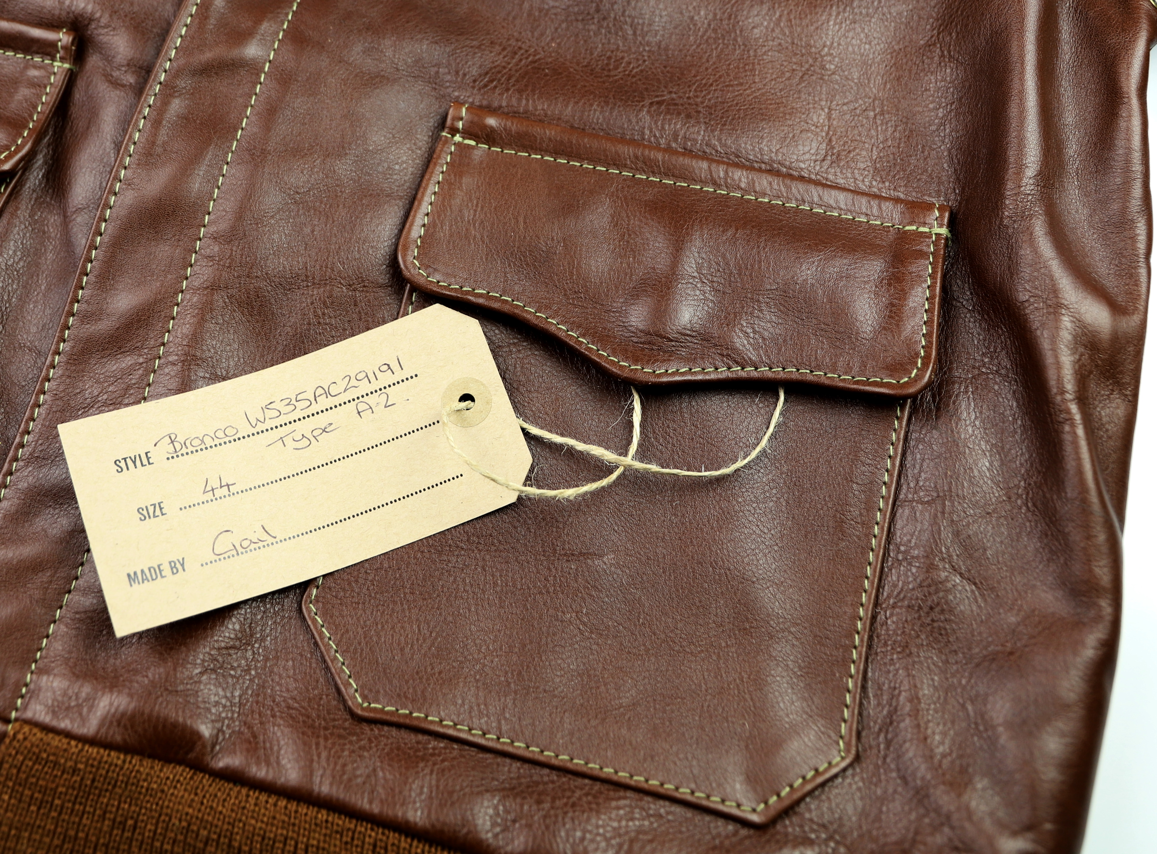 Aero Bronco A-2 Russet Vicenza Horsehide ATJ name tag.jpg