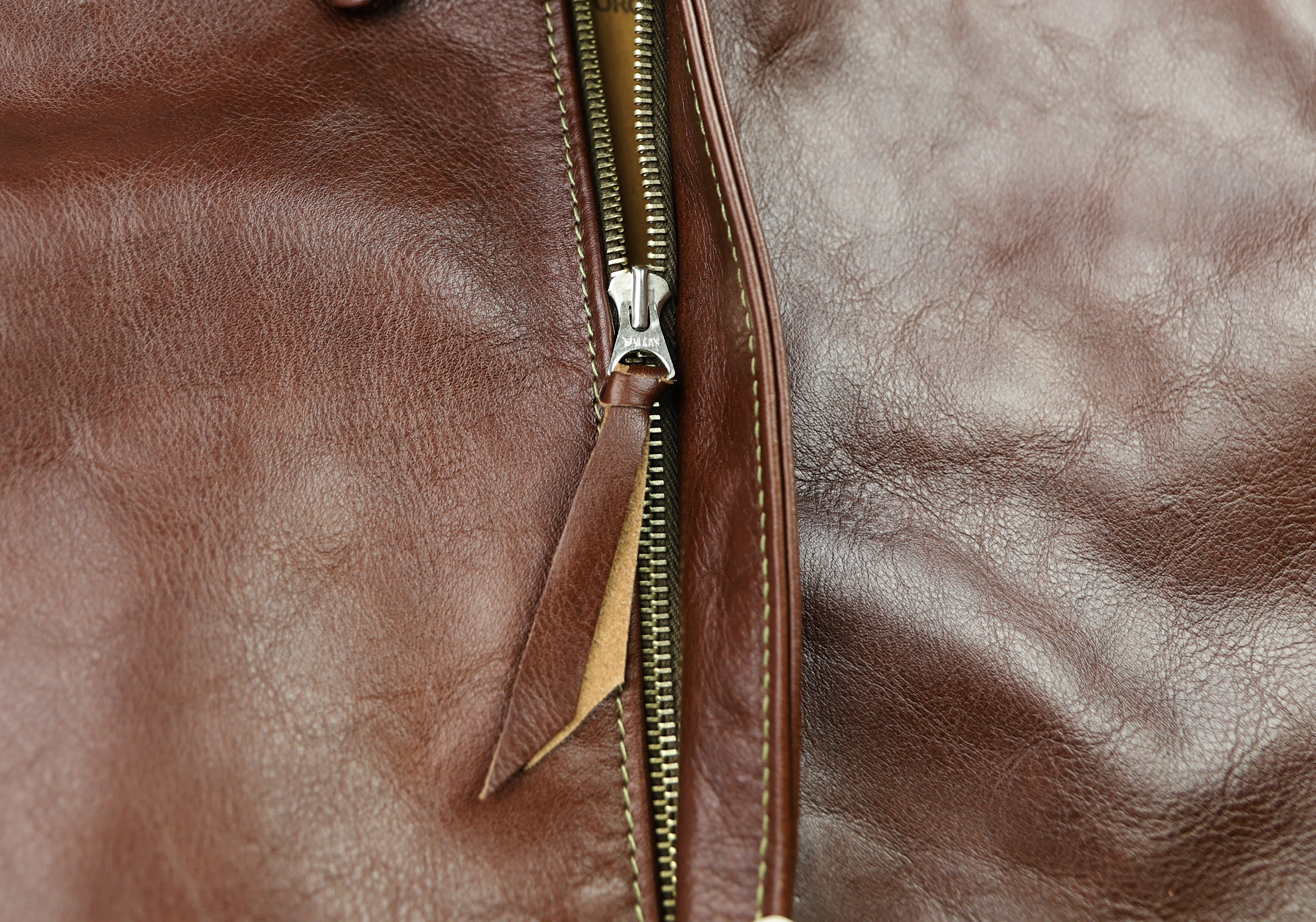 Aero Bronco A-2 Russet Vicenza Horsehide ATJ zipper pull.jpg