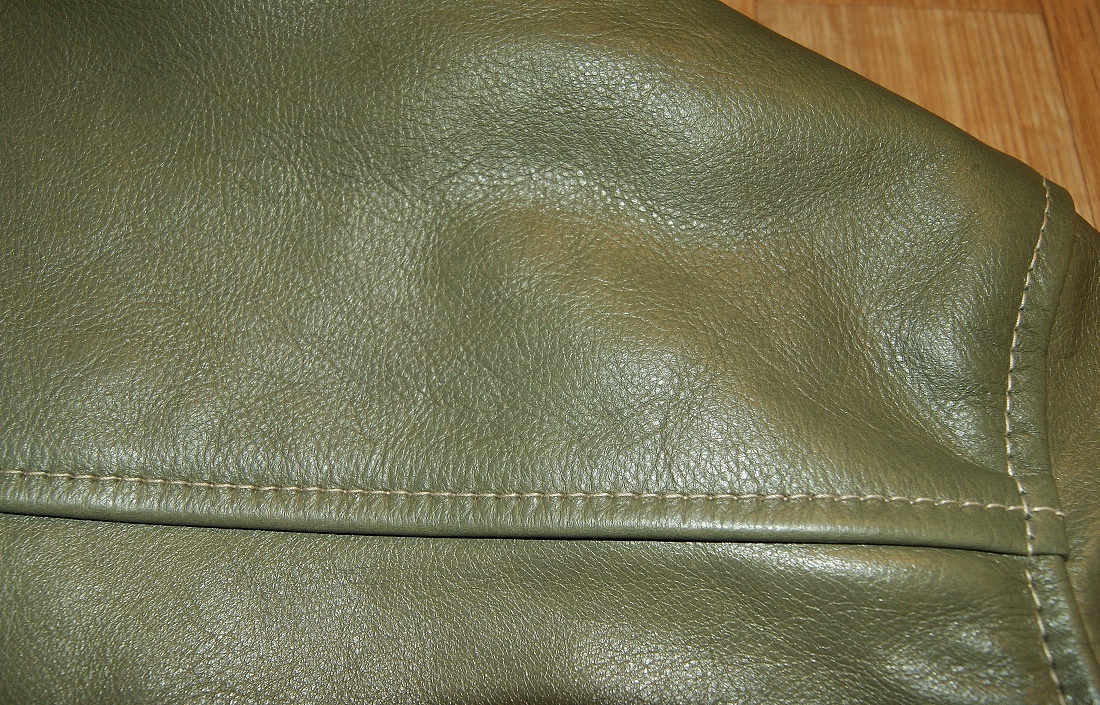 Aero Buco Board Racer Olive Vicenza Horsehide back grain.jpg