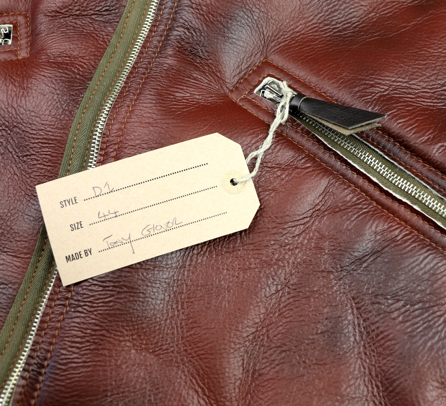 Aero D-1 Redskin Dark Seal Horsehide trim 7ET name tag.jpg