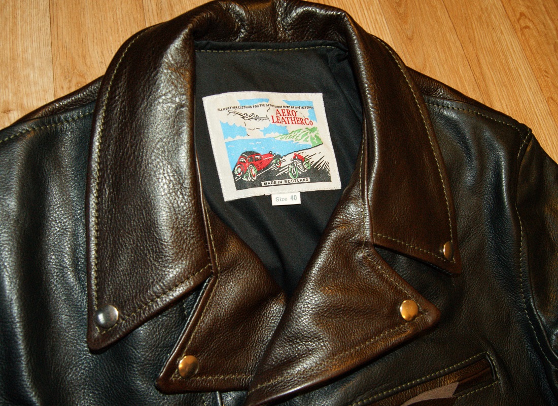 Aero D-Pocket Ridley Two-Tone Dark Seal and Black Vicenza Horsehide tag.jpg