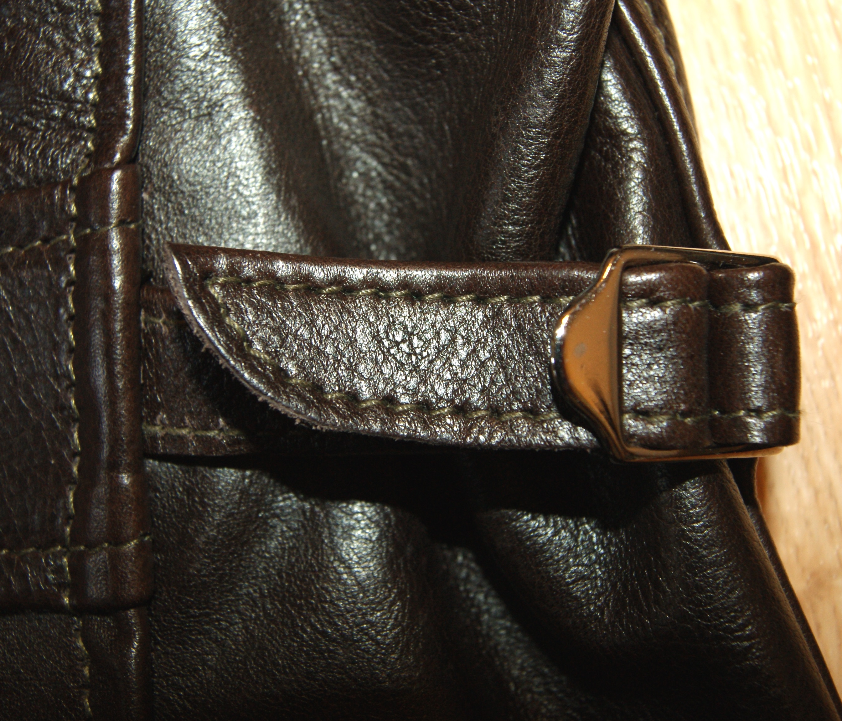 Aero Dustbowl Speedway Dark Seal Vicenza Horsehide side strap.jpg