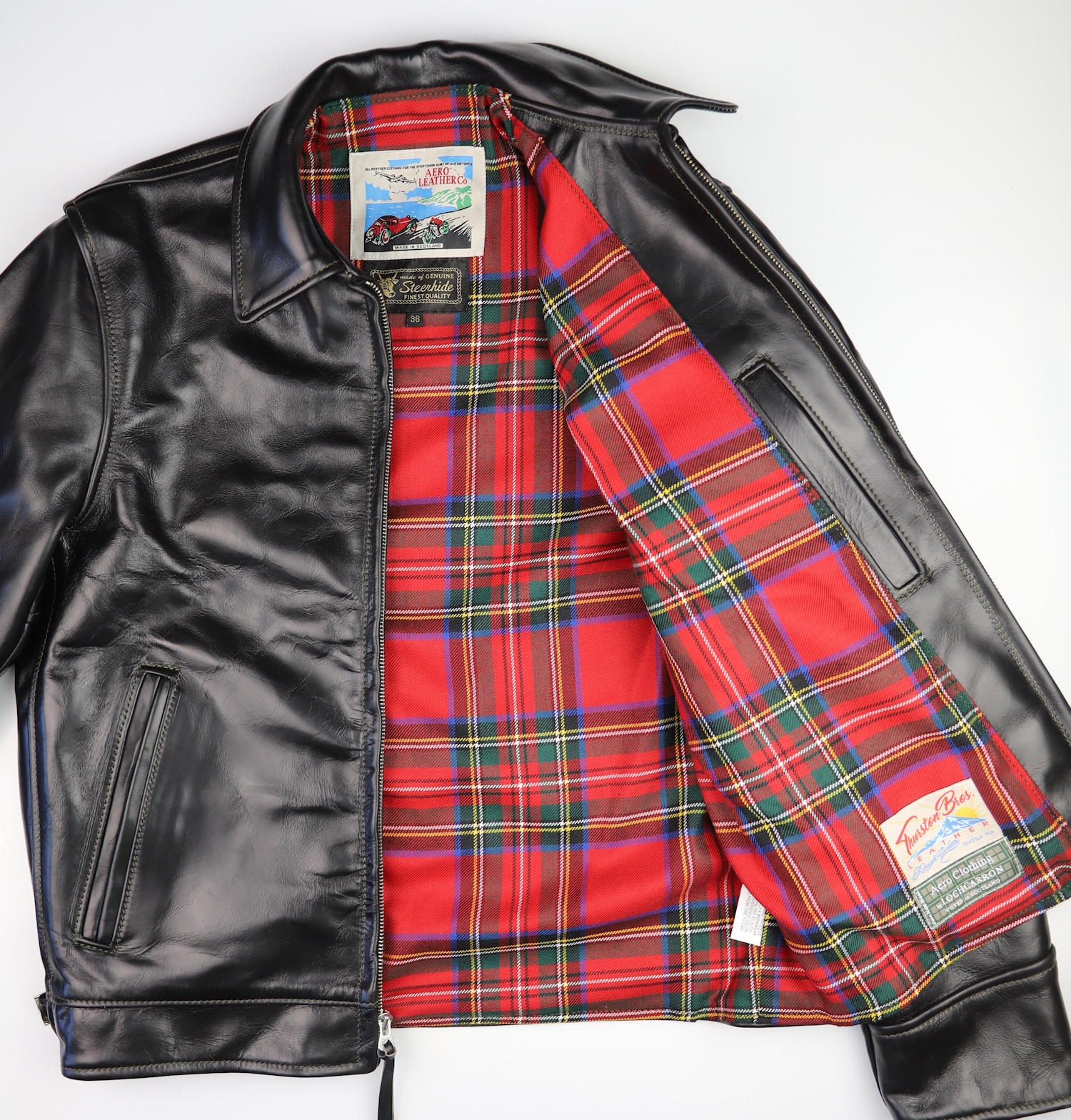 Aero Highwayman Black CXL Steerhide RV8 Royal Stewart tartan lining.jpg