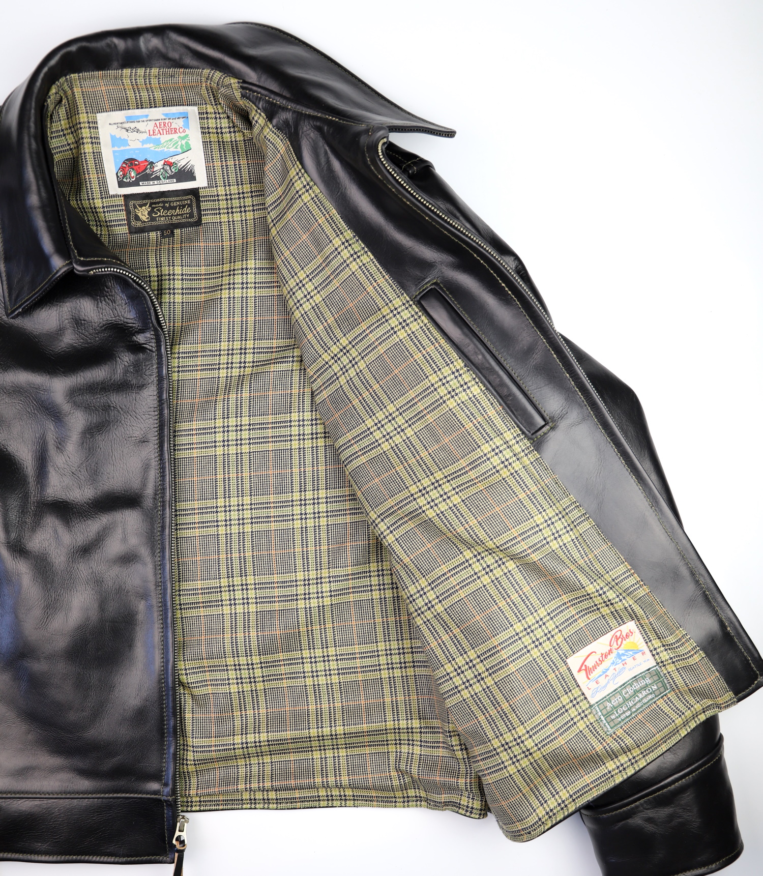 Aero Highwayman Black CXL Steerhide V8X Eccles Check Tweed lining.jpg