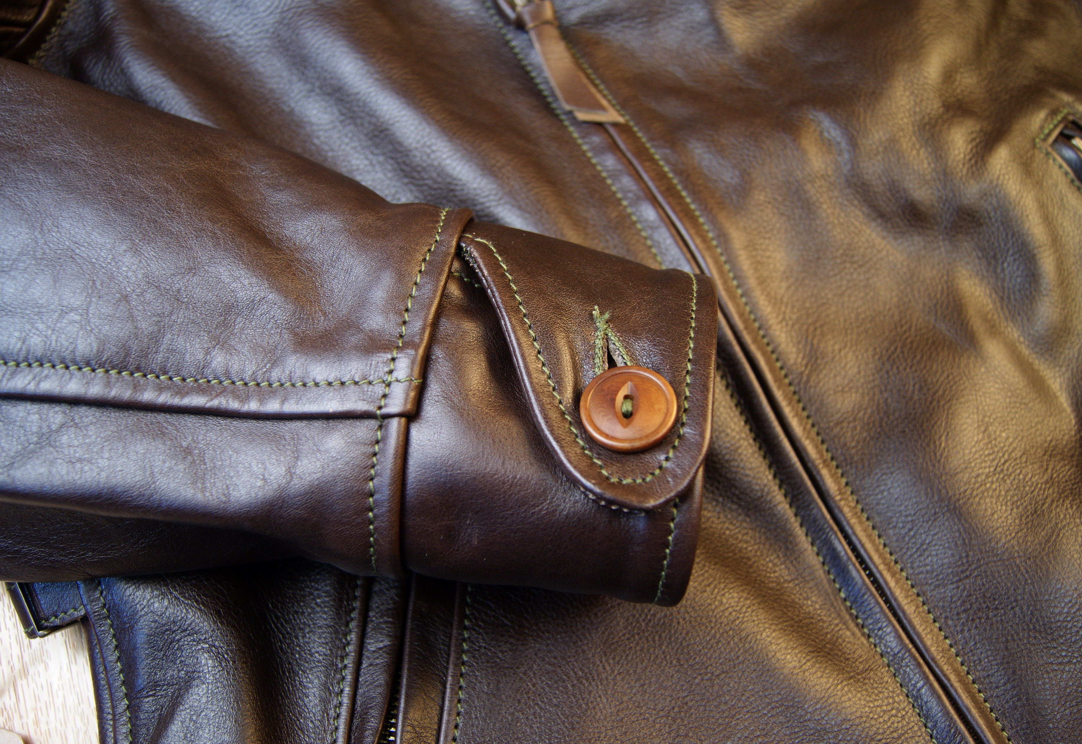 Aero Hooch Hauler Dark Seal Vicenza Horsehide 7JS button cuff.jpg