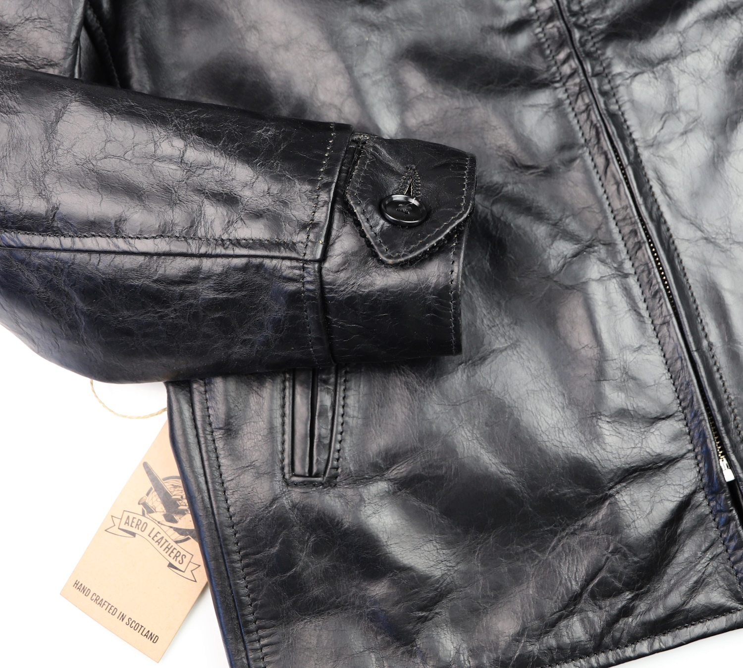 Aero Plainsman Black CXL Steerhide RT1 button cuff.jpg