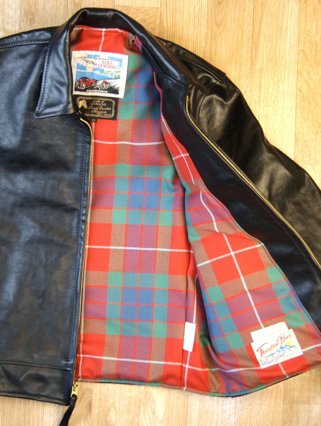 Aero Premier Highwayman Black Vicenza Horsehide CC6 Frasier Red Ancient tartan lining.jpg