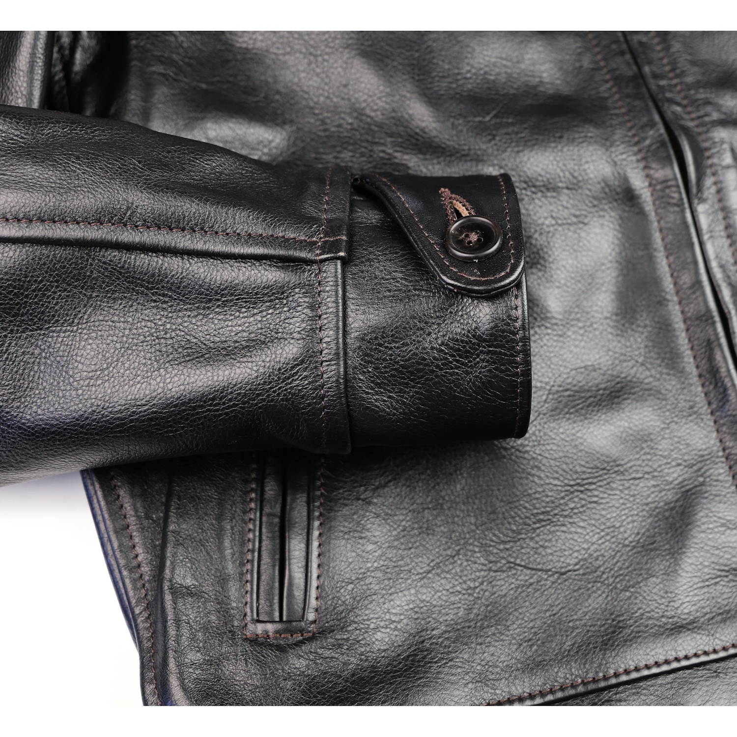 Aero Premier Highwayman Blackened Brown Vicenza CT1 button cuff.jpg