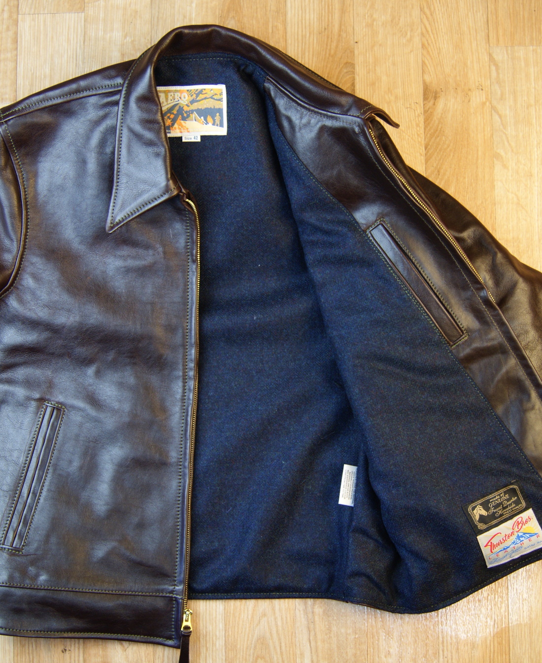 Aero Premier Highwayman Dark Seal Vicenza Horsehide FY7 blue herringbone lining.jpg