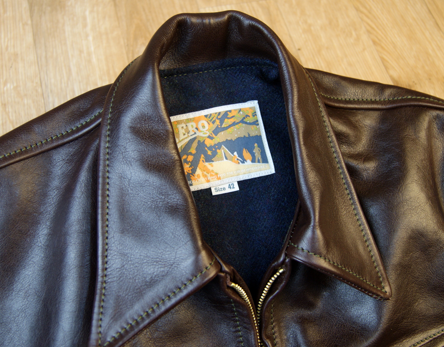 Aero Premier Highwayman Dark Seal Vicenza Horsehide FY7 tag.jpg