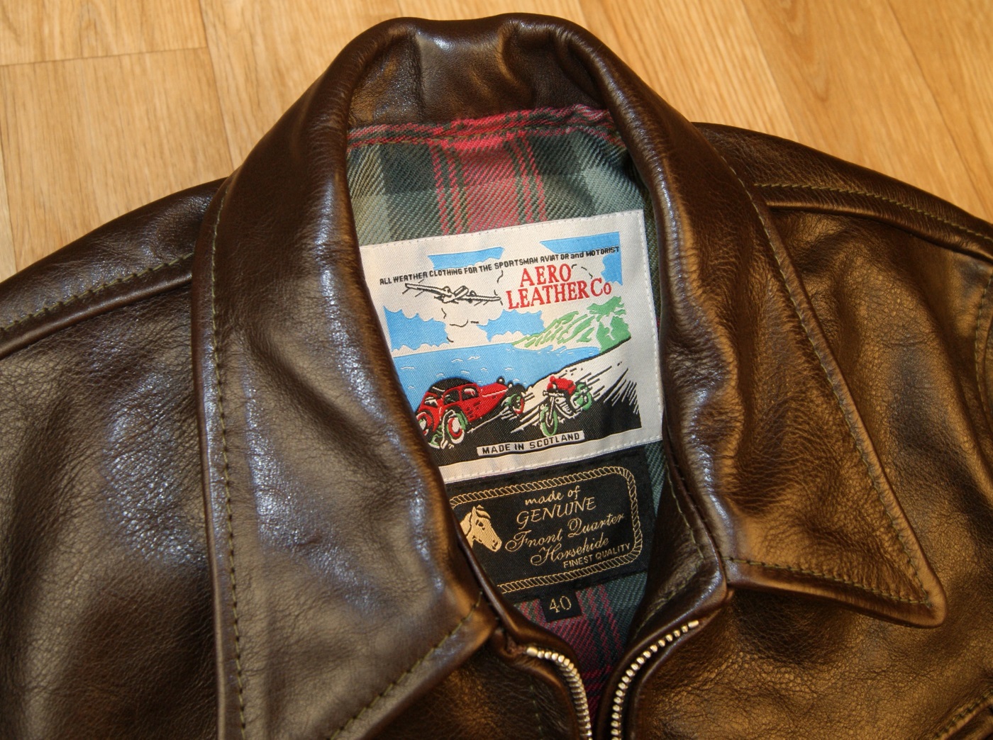 Aero Premier Highwayman Dark Seal Vicenza Horsehide HF5 tag.jpg