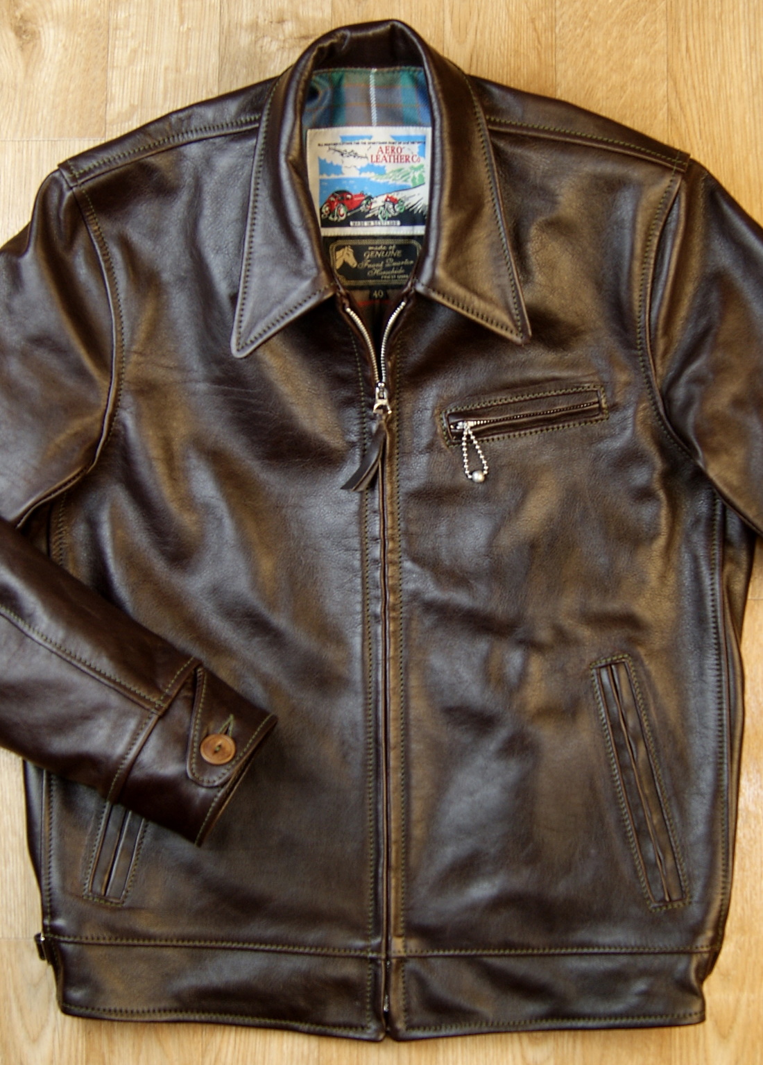 Aero Premier Highwayman Dark Seal Vicenza Horsehide JDN1 front.jpg