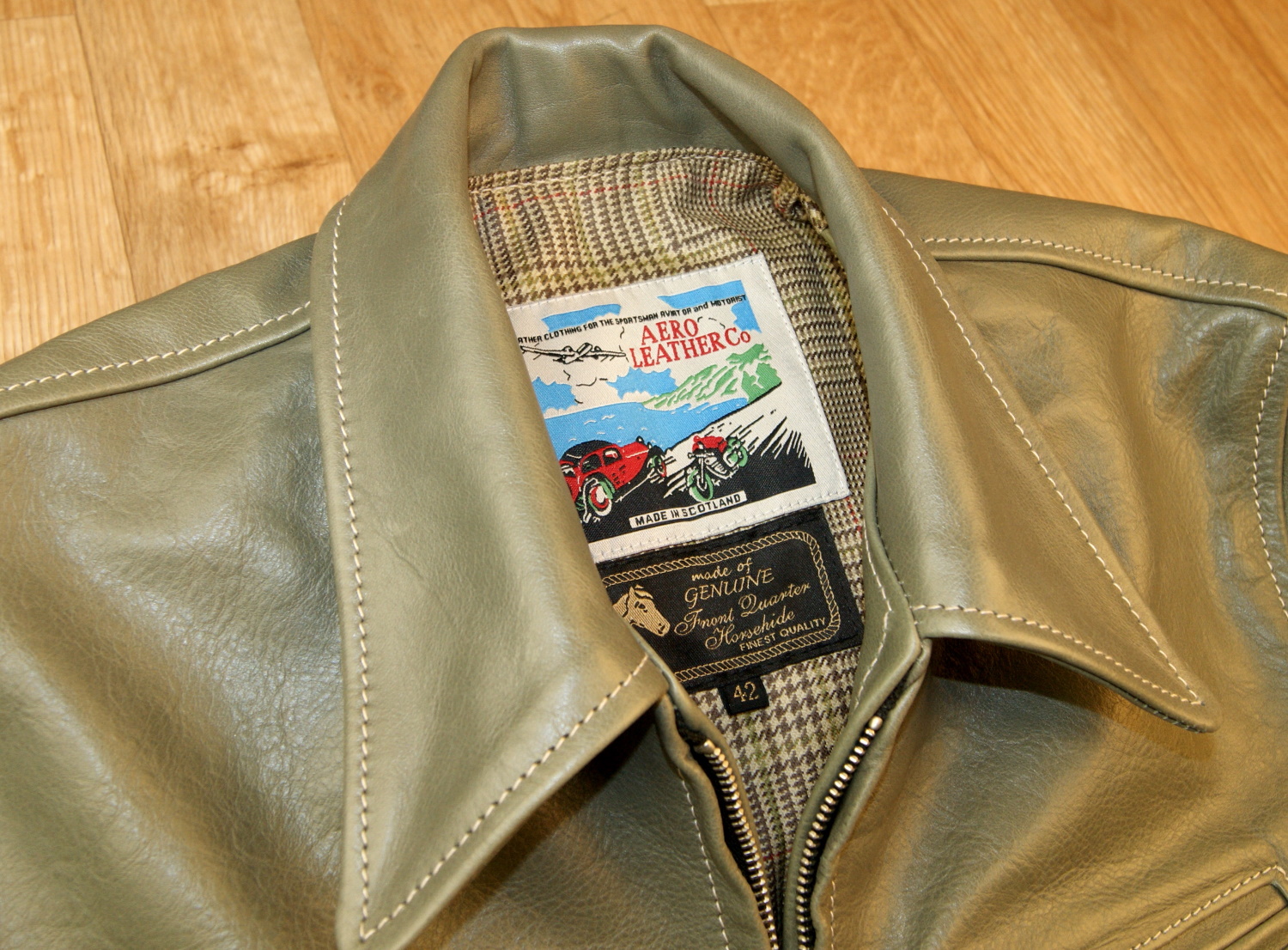 Aero Premier Highwayman Olive Vicenza Horsehide YVK tag.jpg