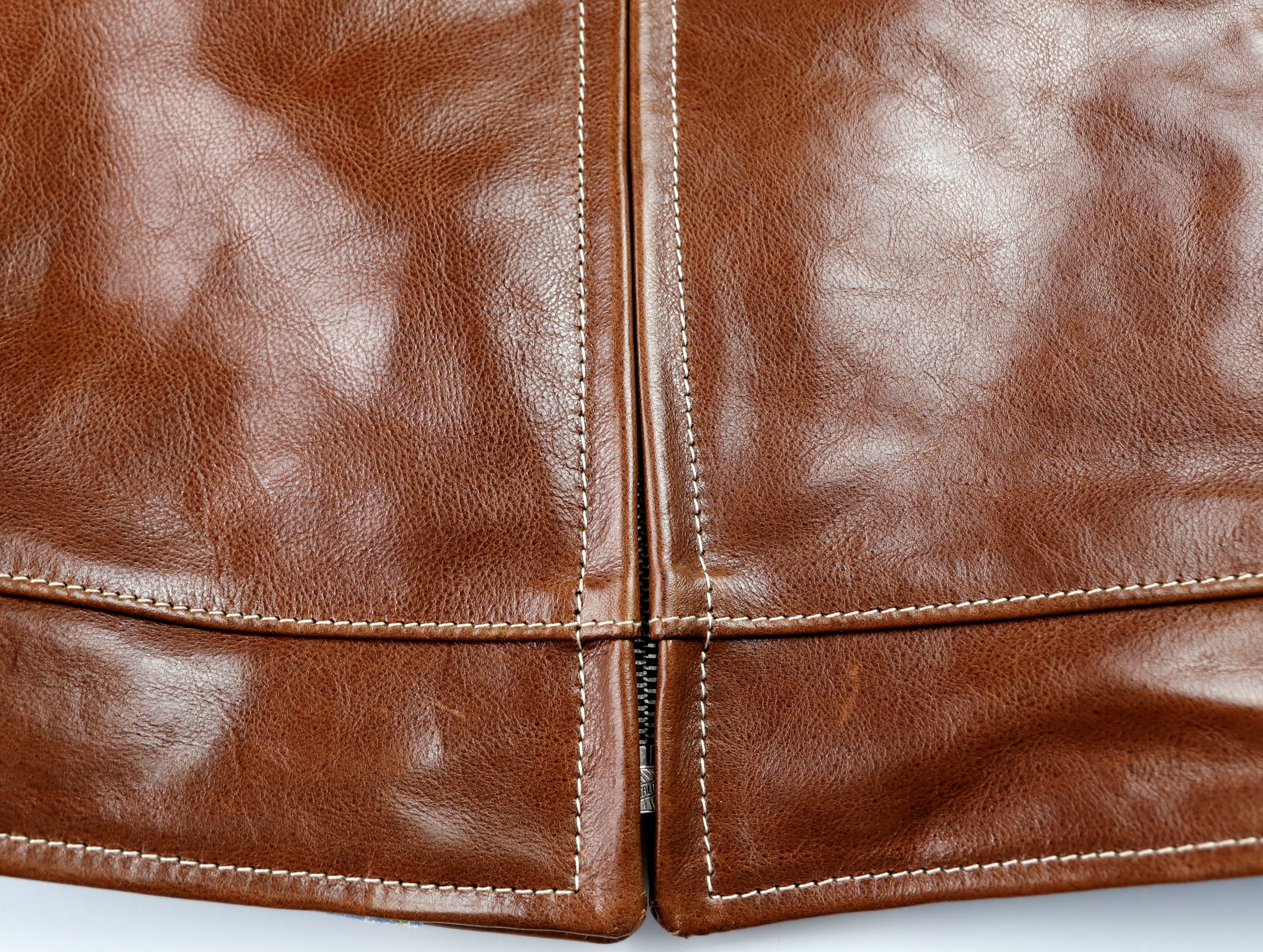 Aero Premier Highwayman Russet Badalassi Cowhide YCZ bottom hem.jpg