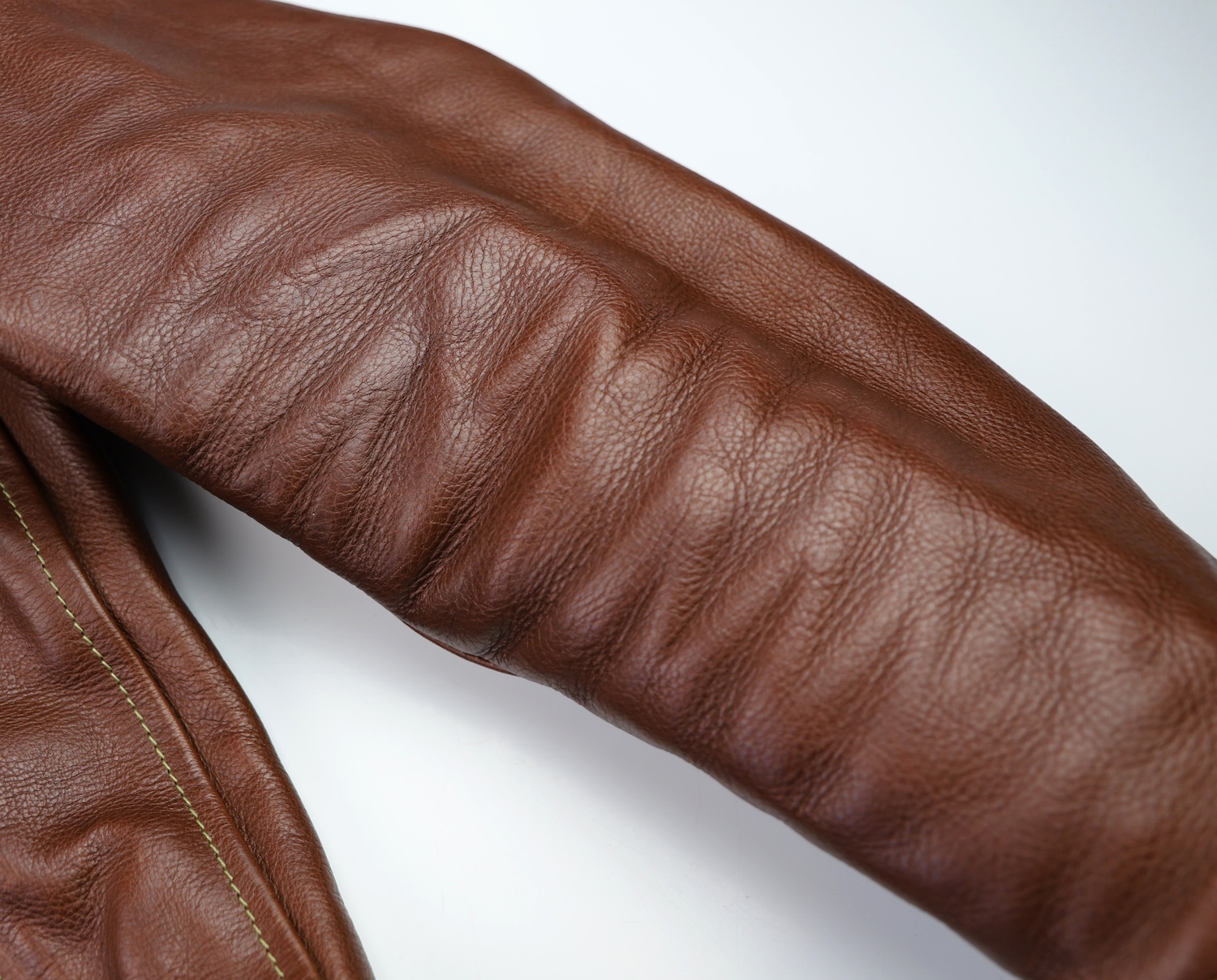 Aero Premier Highwayman Russet Vicenza Horsehide JM Gently Used sleeve wrinkles.jpg