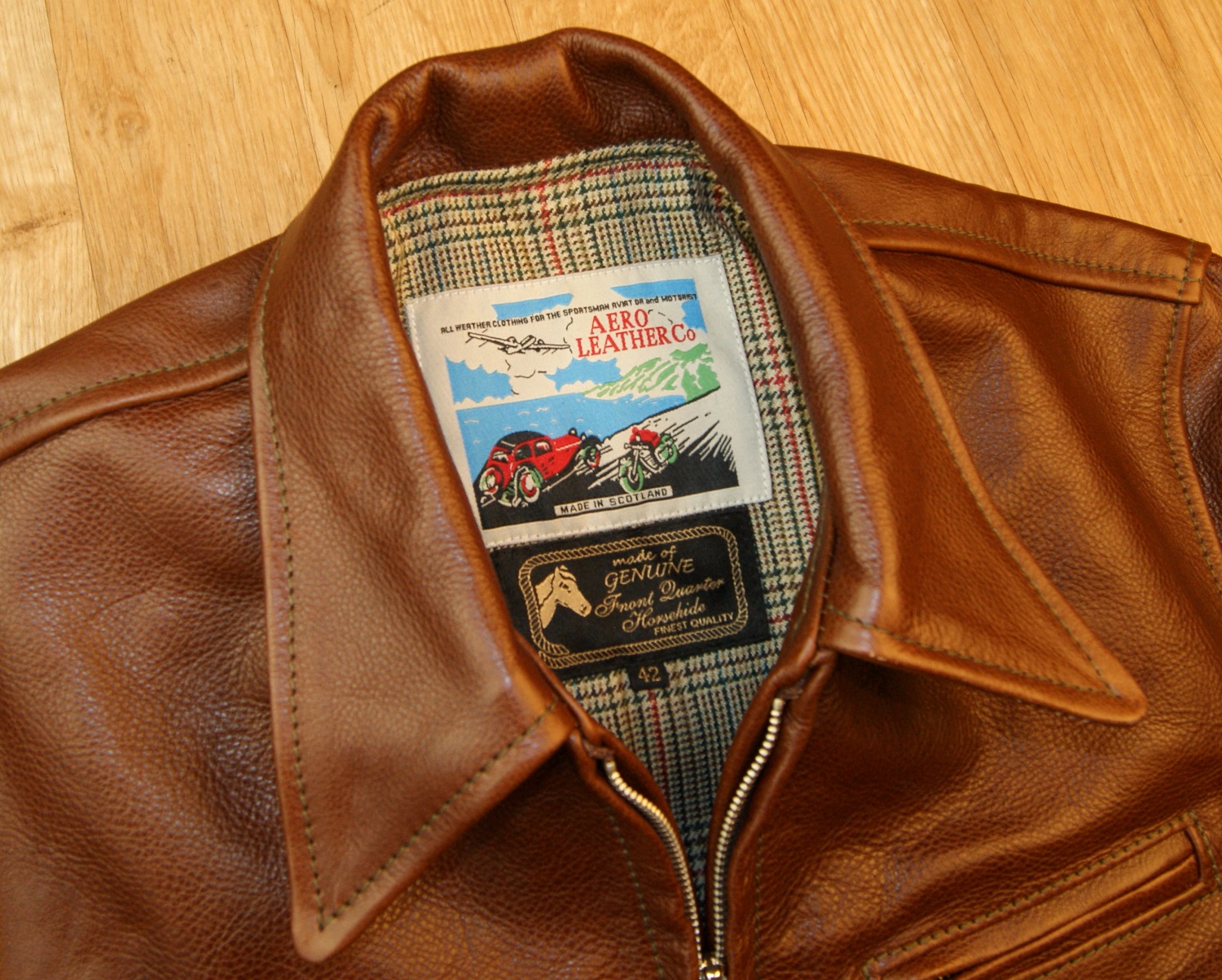 Aero Premier Highwayman Russet Vicenza Horsehide tag.jpg