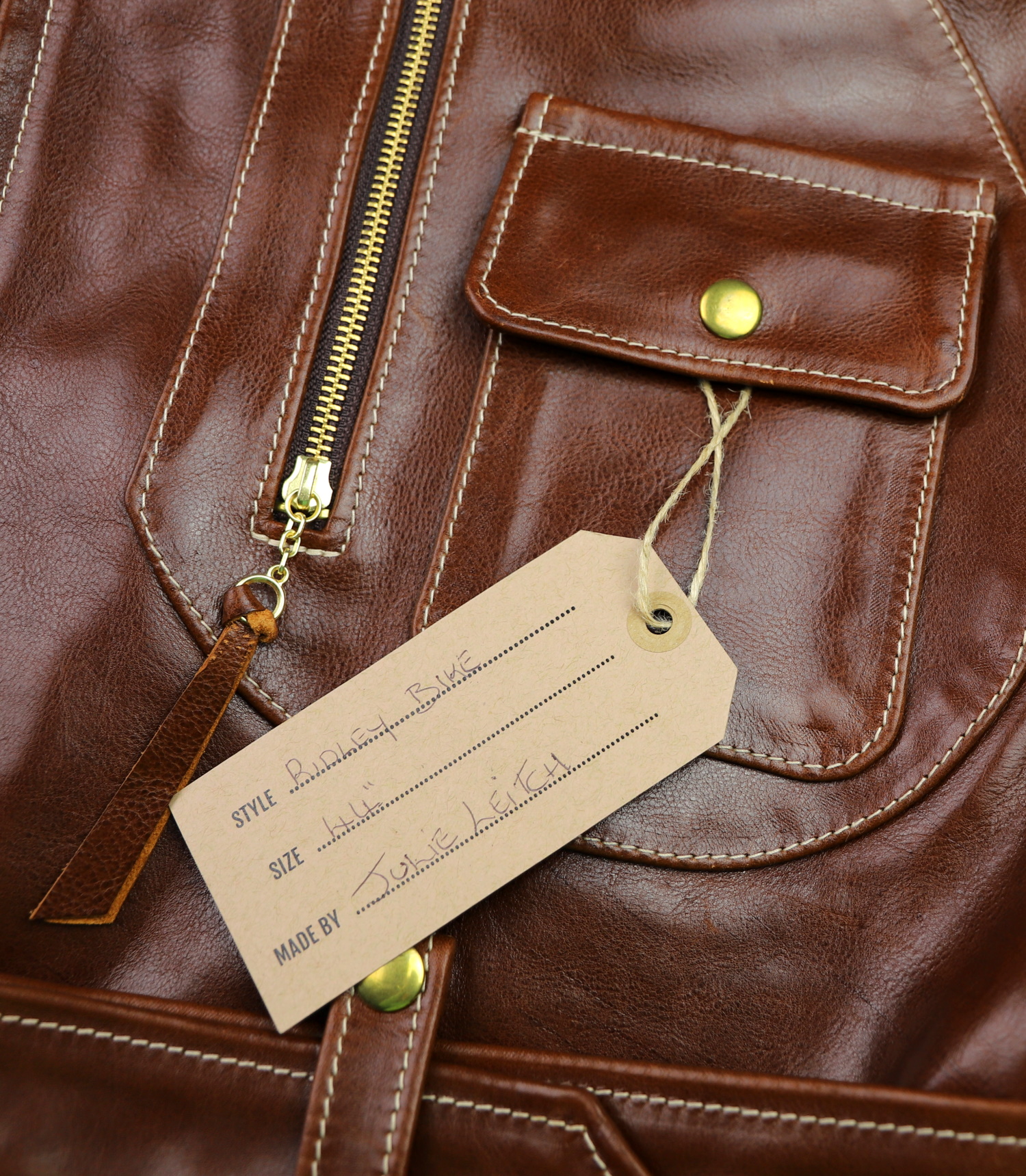 Aero Ridley KOTR Russet Badalassi Cowhide name tag.jpg