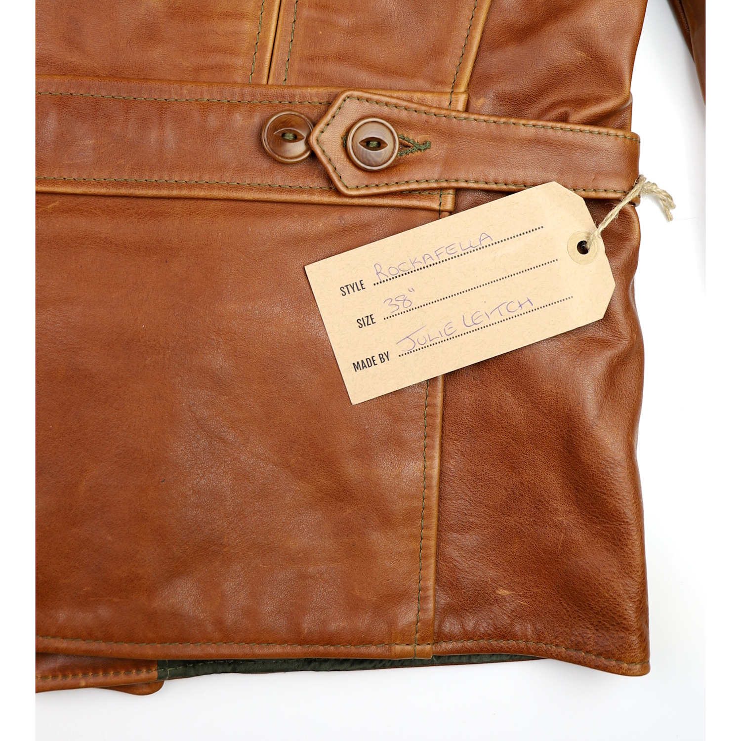 Aero Rockafella Cognac Pinnacle Horsehide name tag.jpg