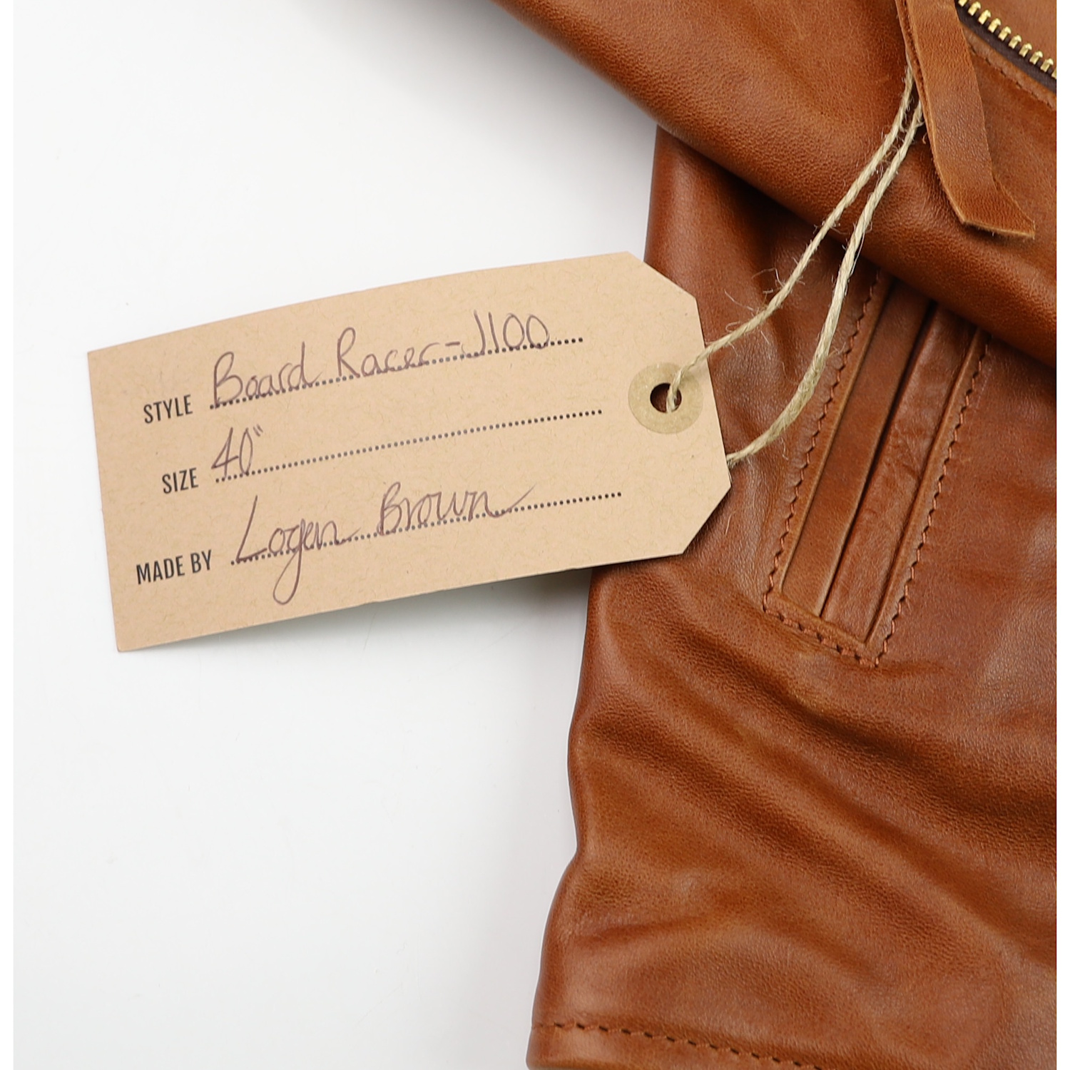 Aero Seven Cognac Pinnacle Horsehide TP7 name tag.jpg