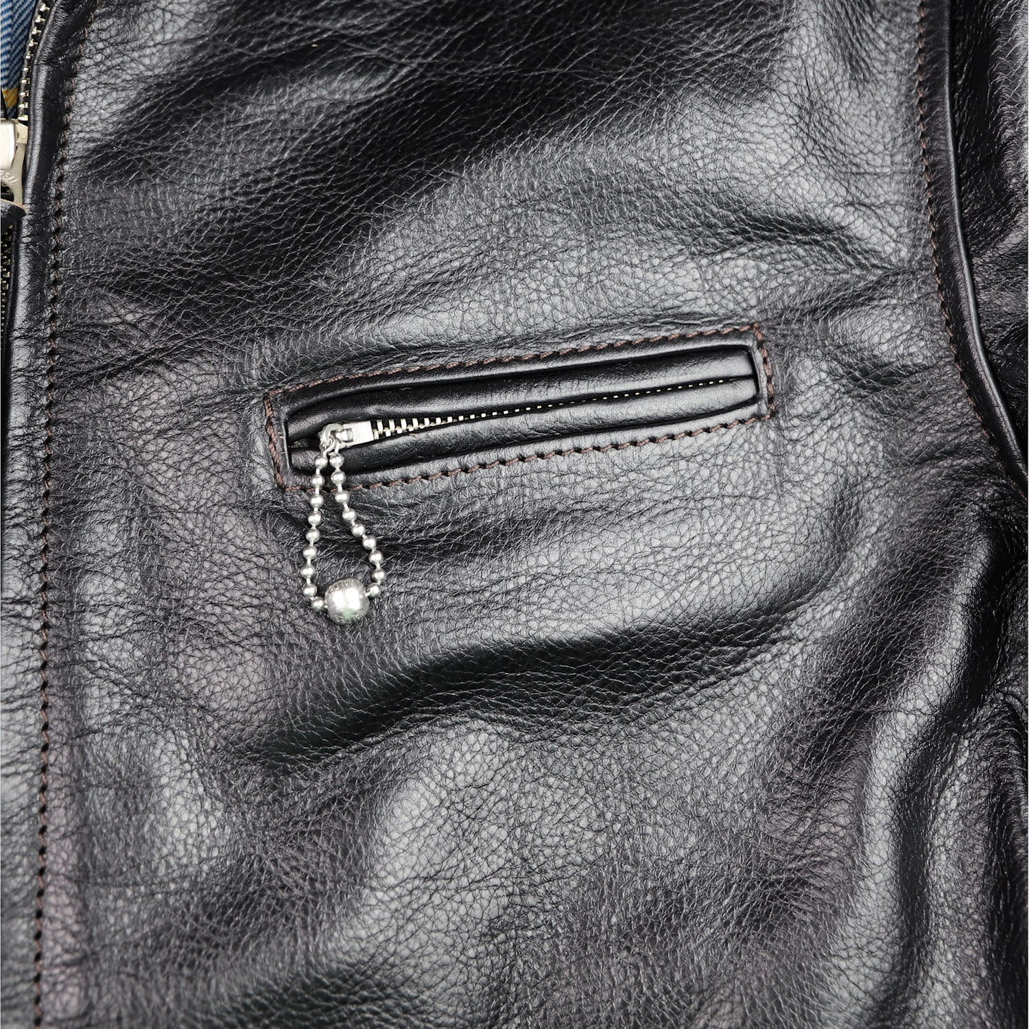 Aero Sunburst Blackened Brown Vicenza Horsehide FR22 chest pocket.jpg