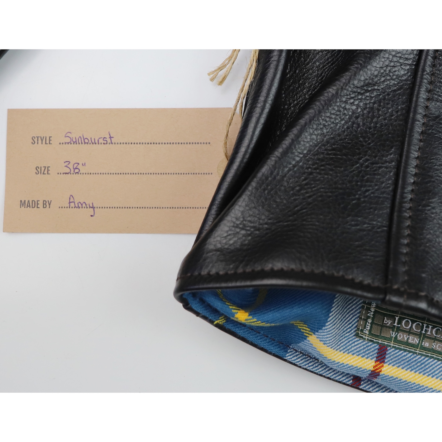 Aero Sunburst Blackened Brown Vicenza Horsehide FR22 name tag.jpg