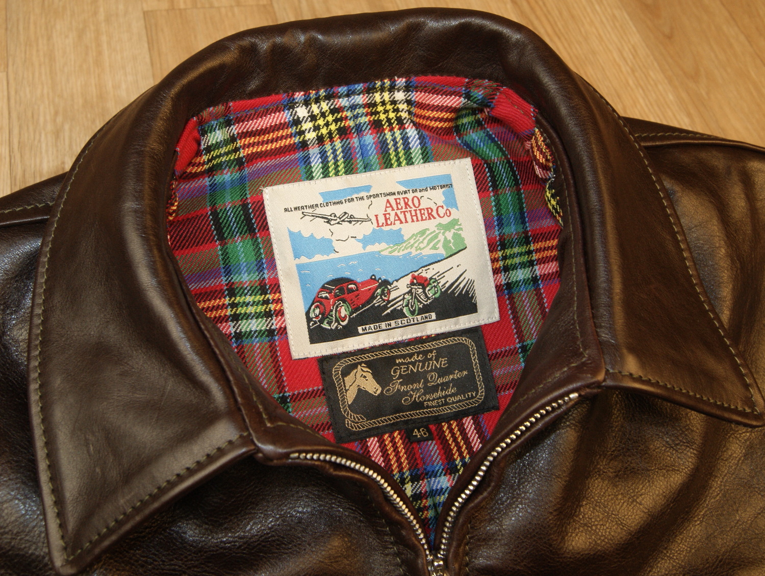 Aero Sunburst Dark Seal Vicenza Horsehide EMY tag.jpg