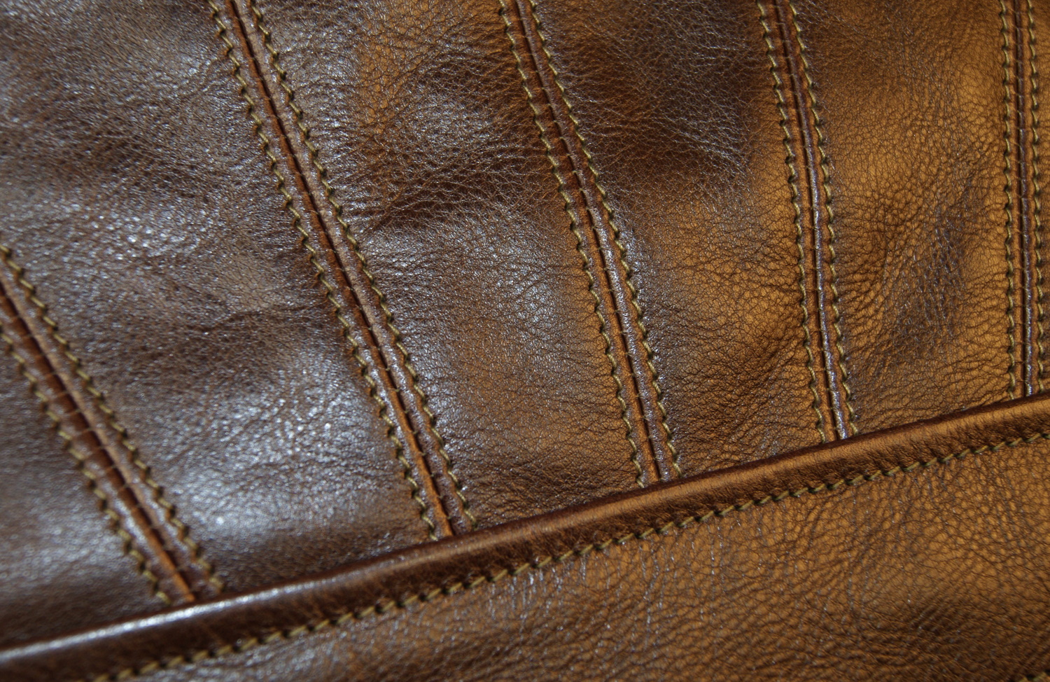 Aero Sunburst Dark Seal Vicenza Horsehide GBU back stitching.jpg