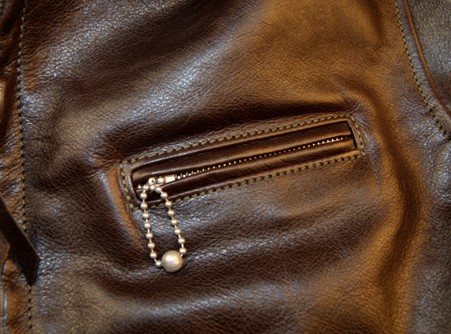 Aero Sunburst Dark Seal Vicenza Horsehide GBU chest pocket.jpg