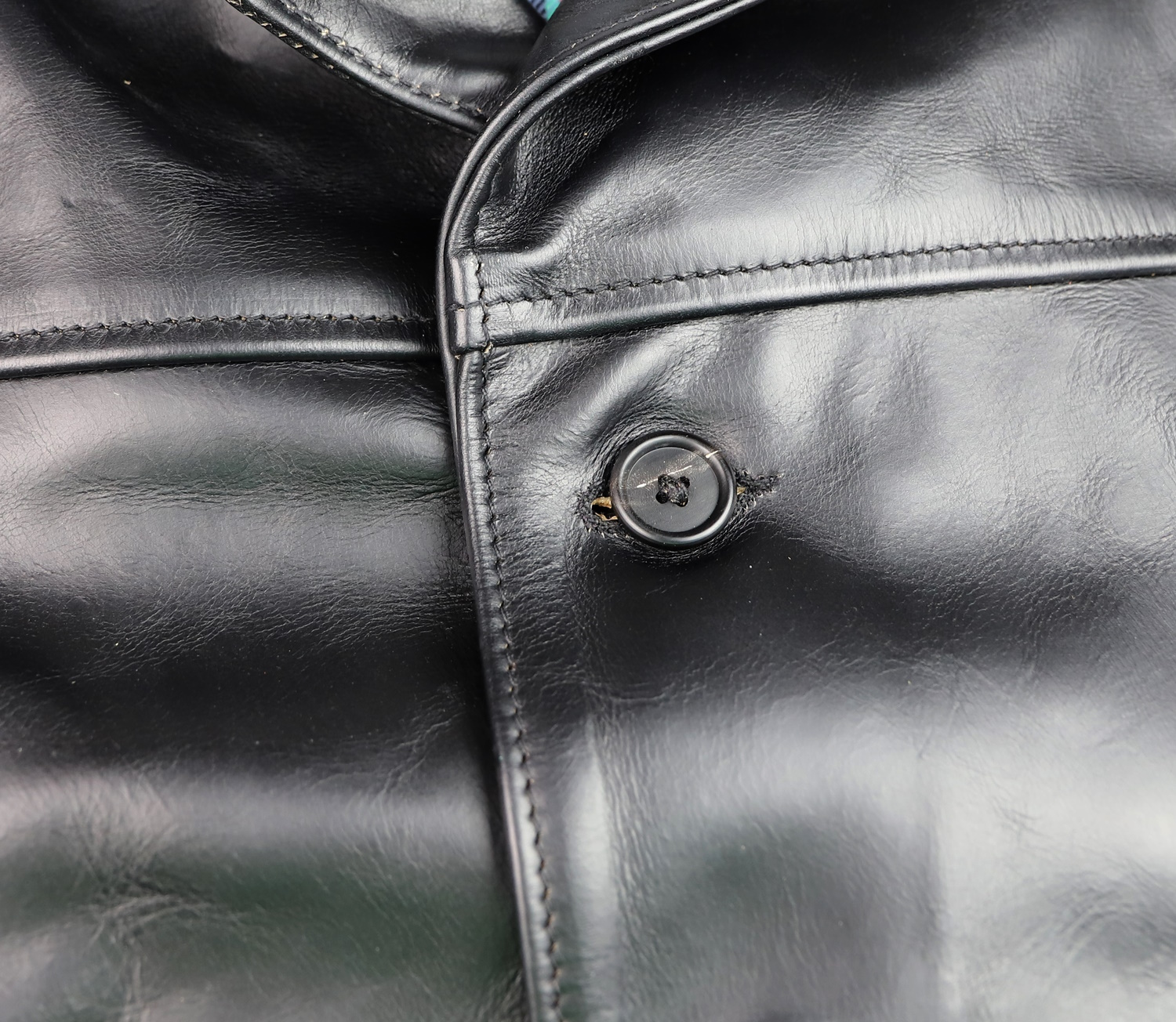 Aero Teamster Black CXL Steerhide G5V button.jpg