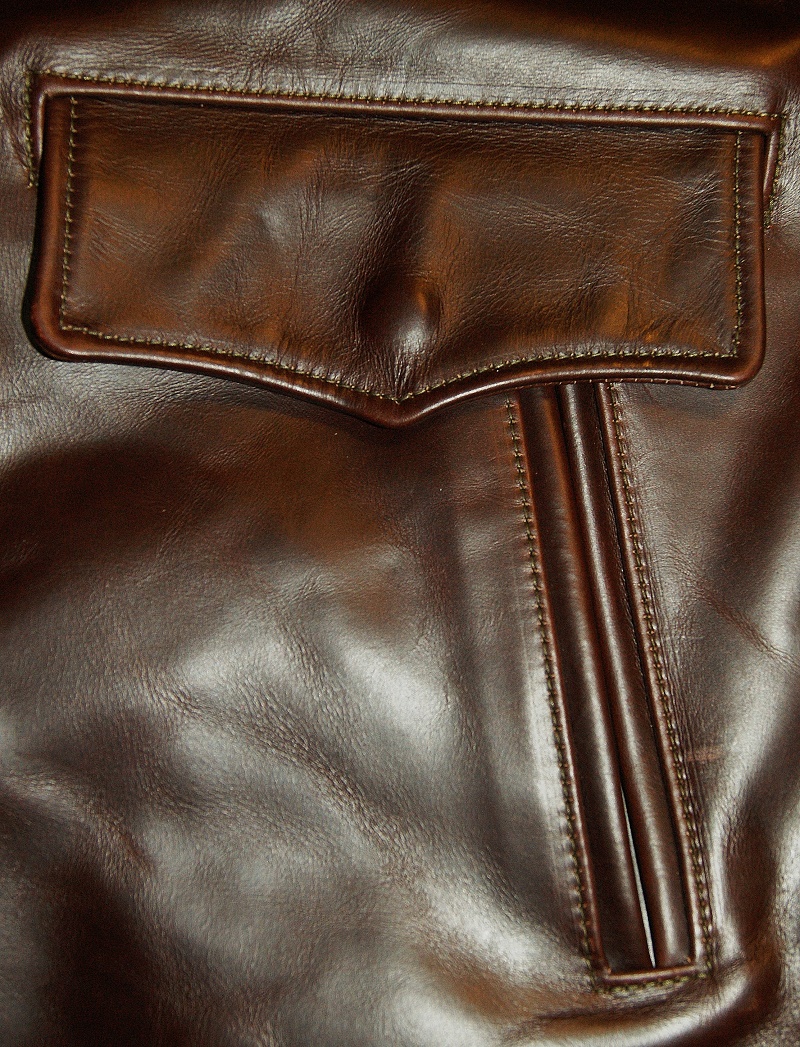 Aero Teamster Brown CXL Steerhide 46 hadnwarmer pocket.jpg