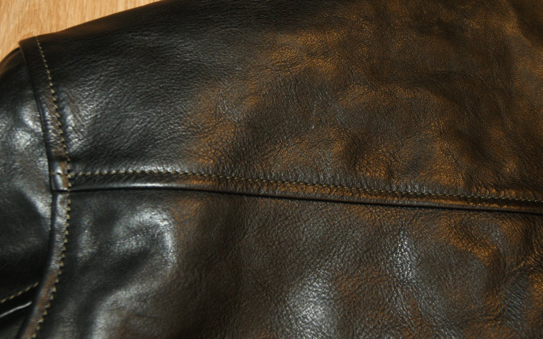 Aero Thunderbay Black Vicenza Horsehide Natural Shearling yoke grain.jpg