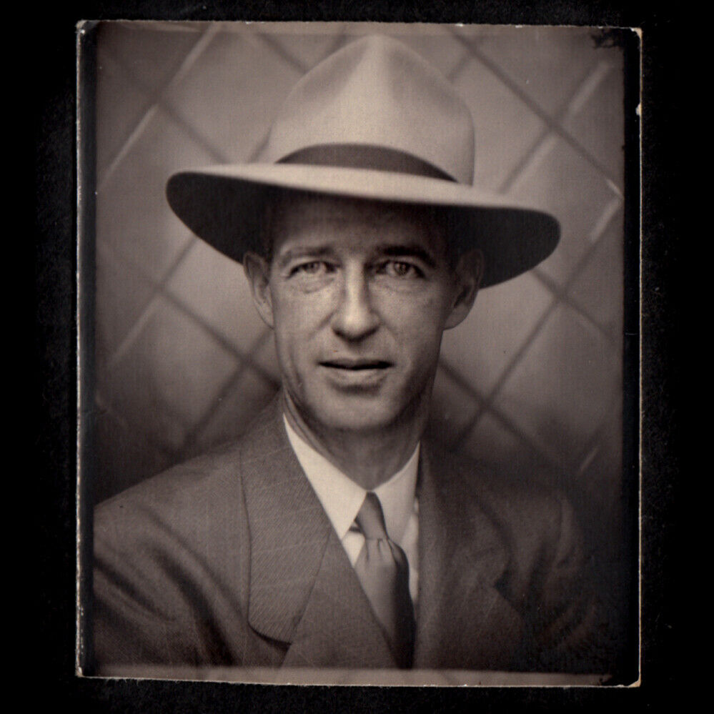 GIGANTIC-FEDORA-TIRED-WISE-EYES-STRESSED-BUSINESSMAN-1930s.jpg