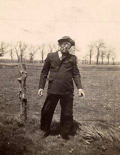 Grandpa Ray with a couple of birthday cigars...1944.jpg