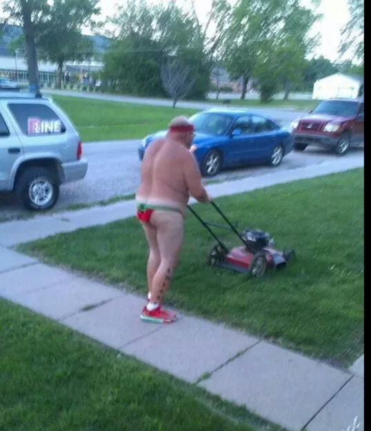 mowing grass in thong.jpg