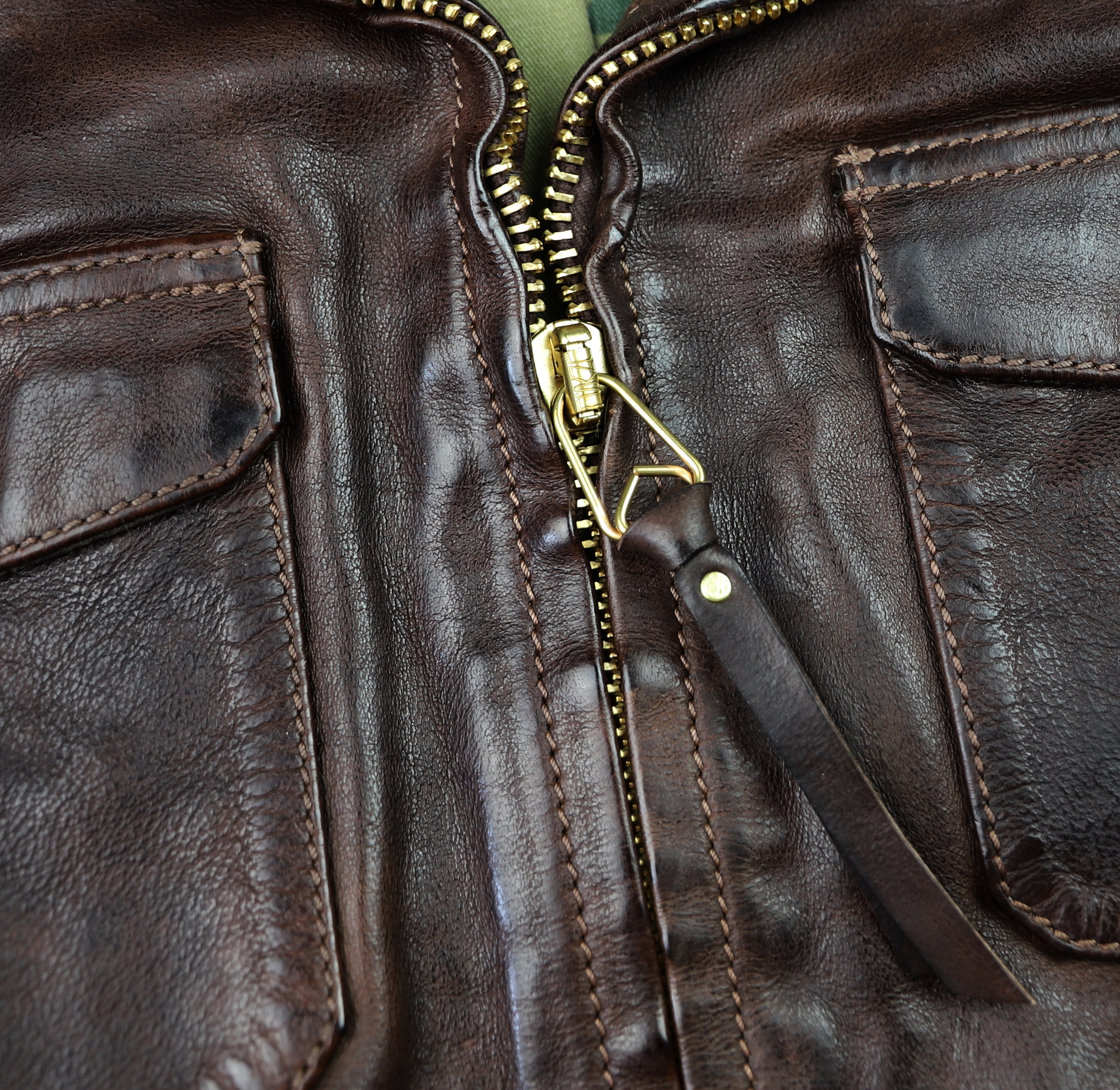 Thedi Atlas Cocoa Buffalo L8D zipper pull.jpg