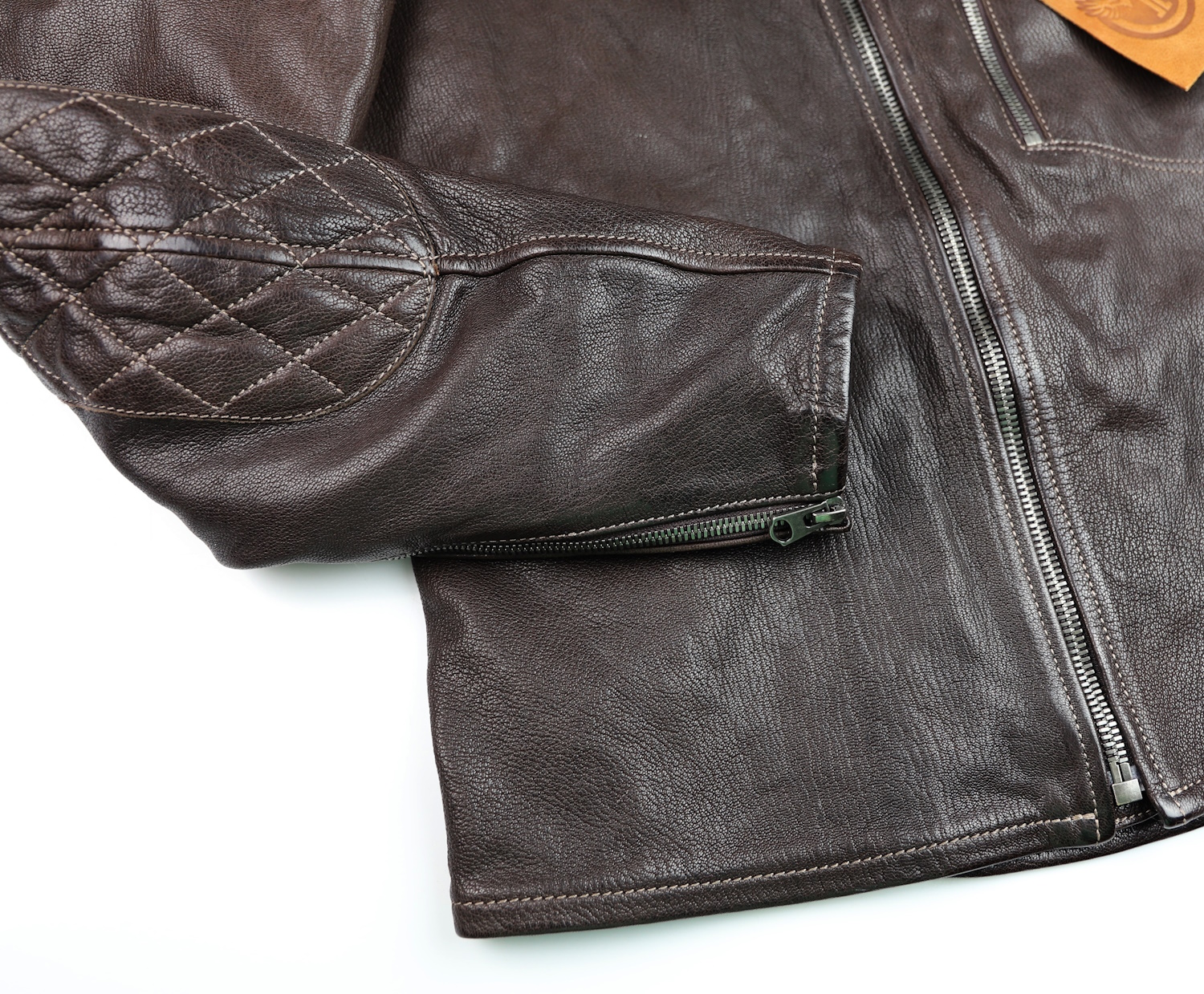 Thedi Cafe Crosszip Seal Goatskin sleeve zipper.jpg