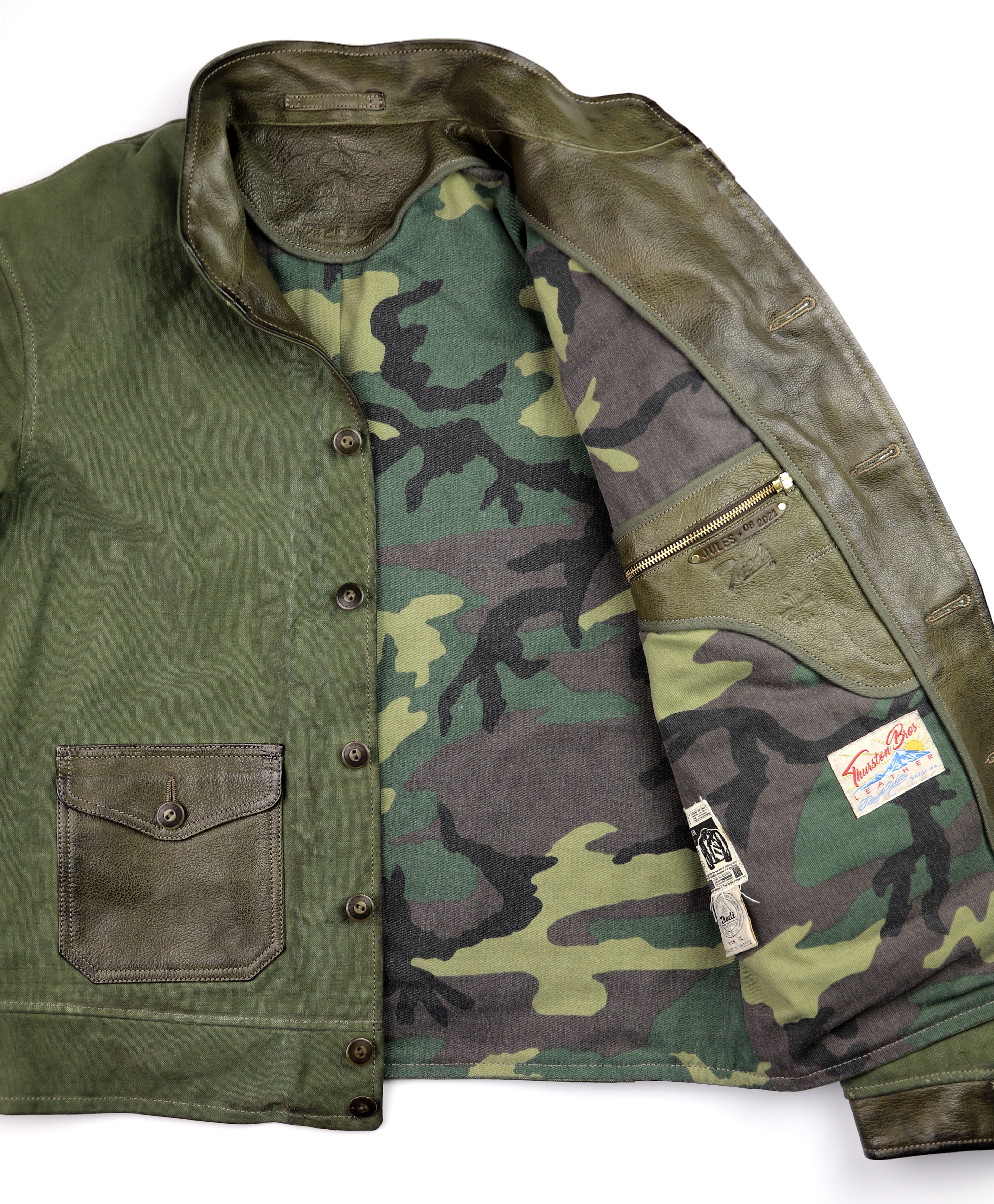 Thedi Canvas and Green Goatskin Button-Up camo lining.jpg