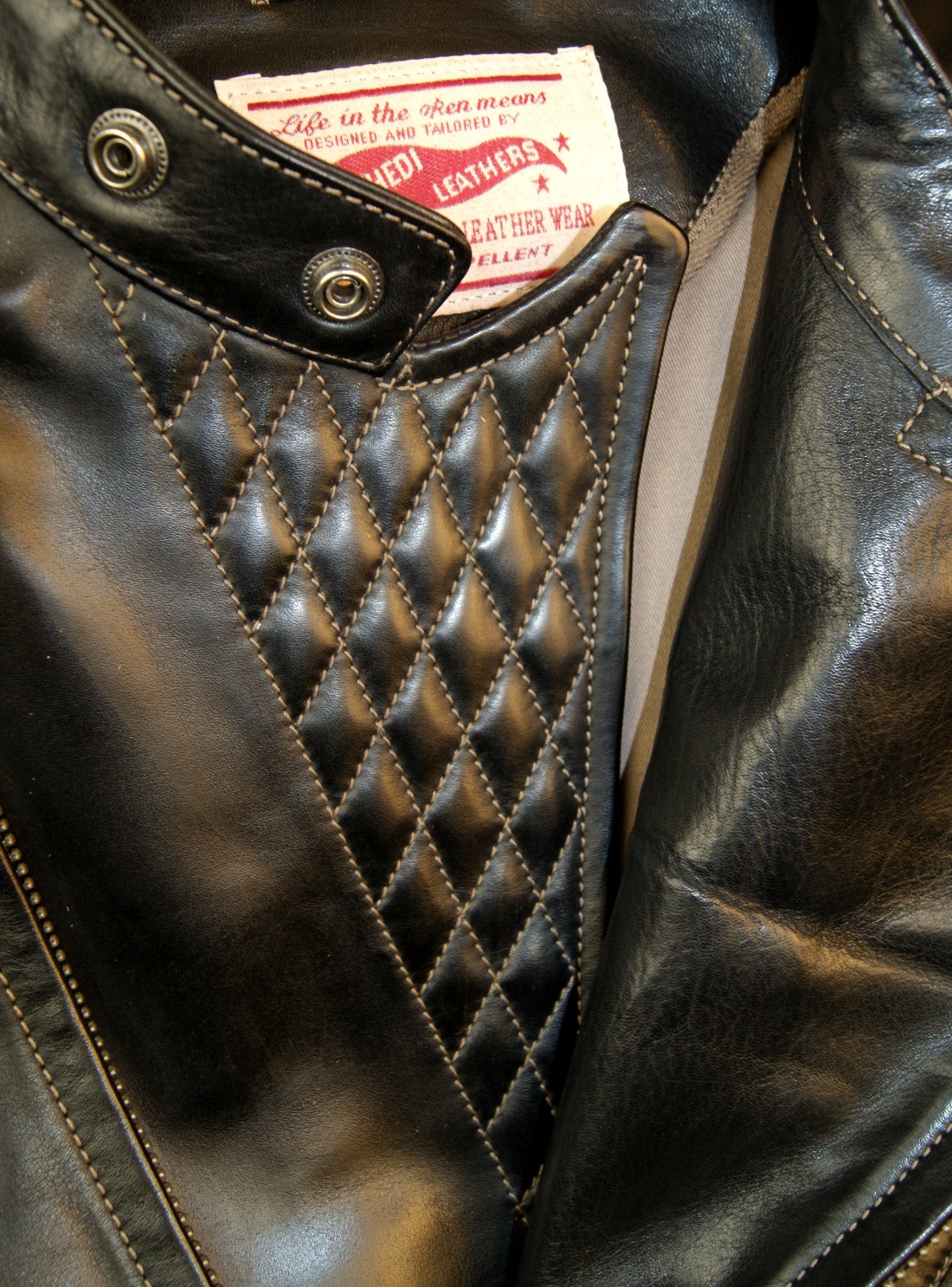 Thedi Crosszip Black Horsehide BQ2 quilting detail.jpg