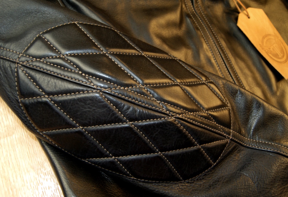 Thedi Custom Phenix Black Horsehide elbow quilting.jpg