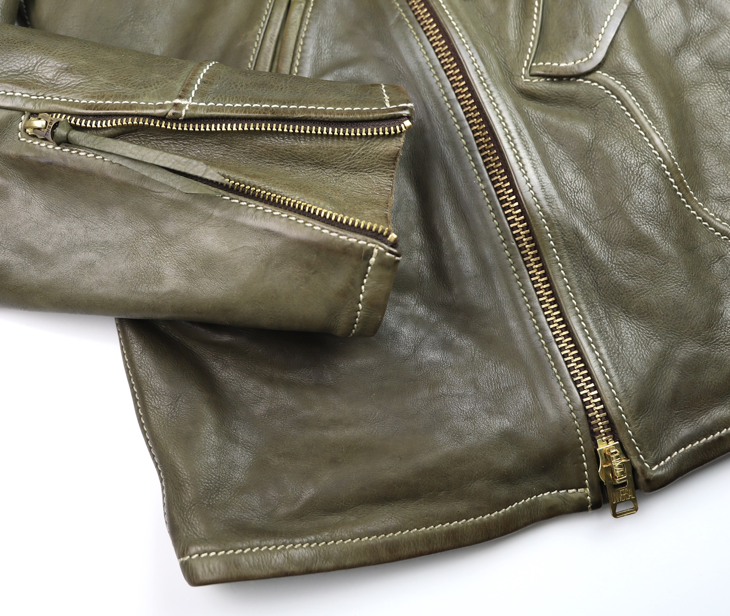 Thedi Evander Green Cowhide sleeve zipper.jpg