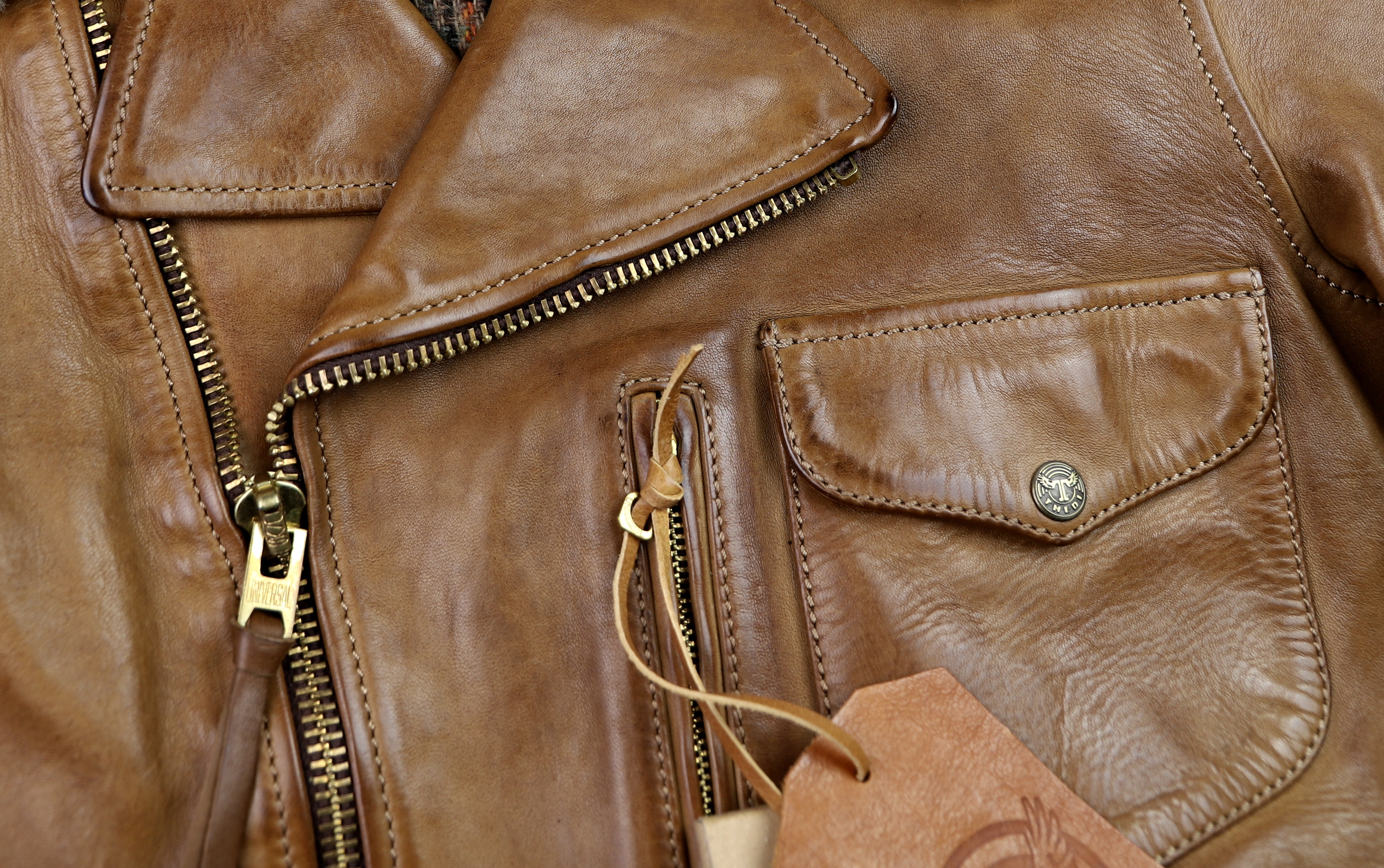 Thedi Hektor Bruciato Horsehide zipper pull.jpg