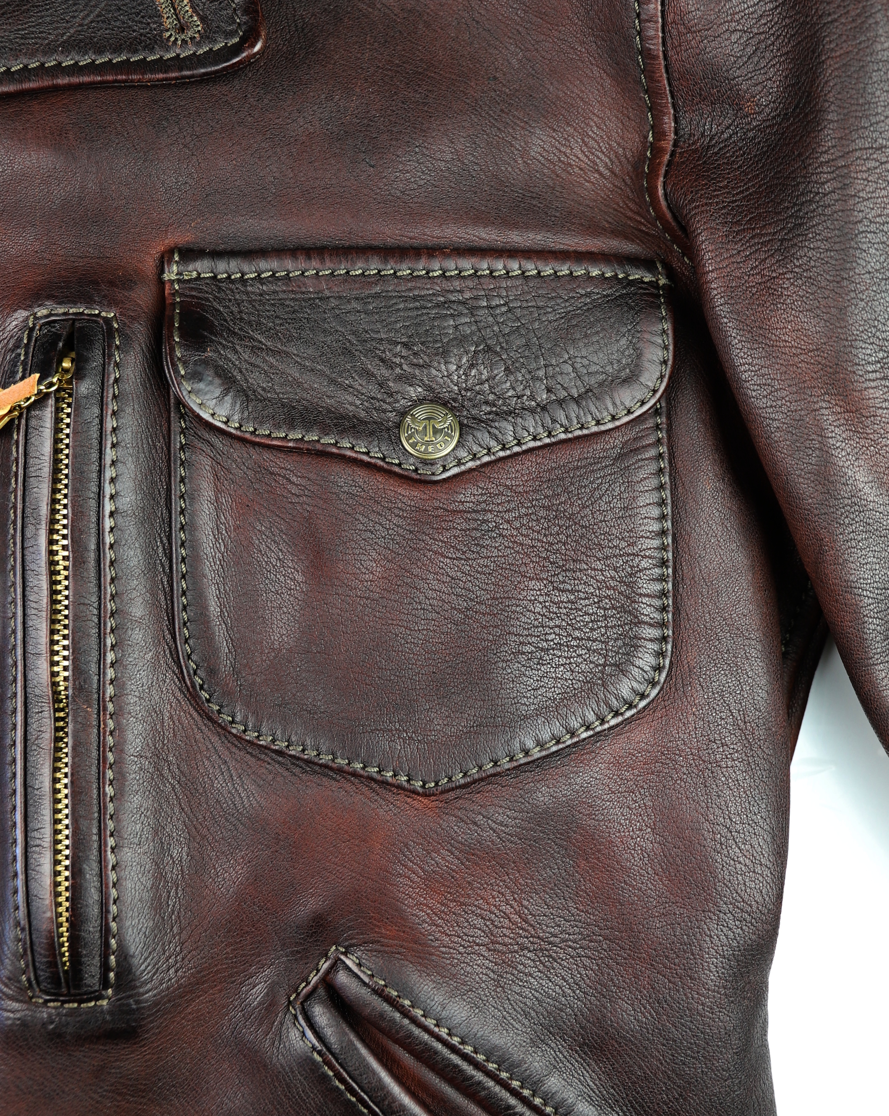 Thedi Hektor Burgundy Bruciato horsehide chest pocket.jpg