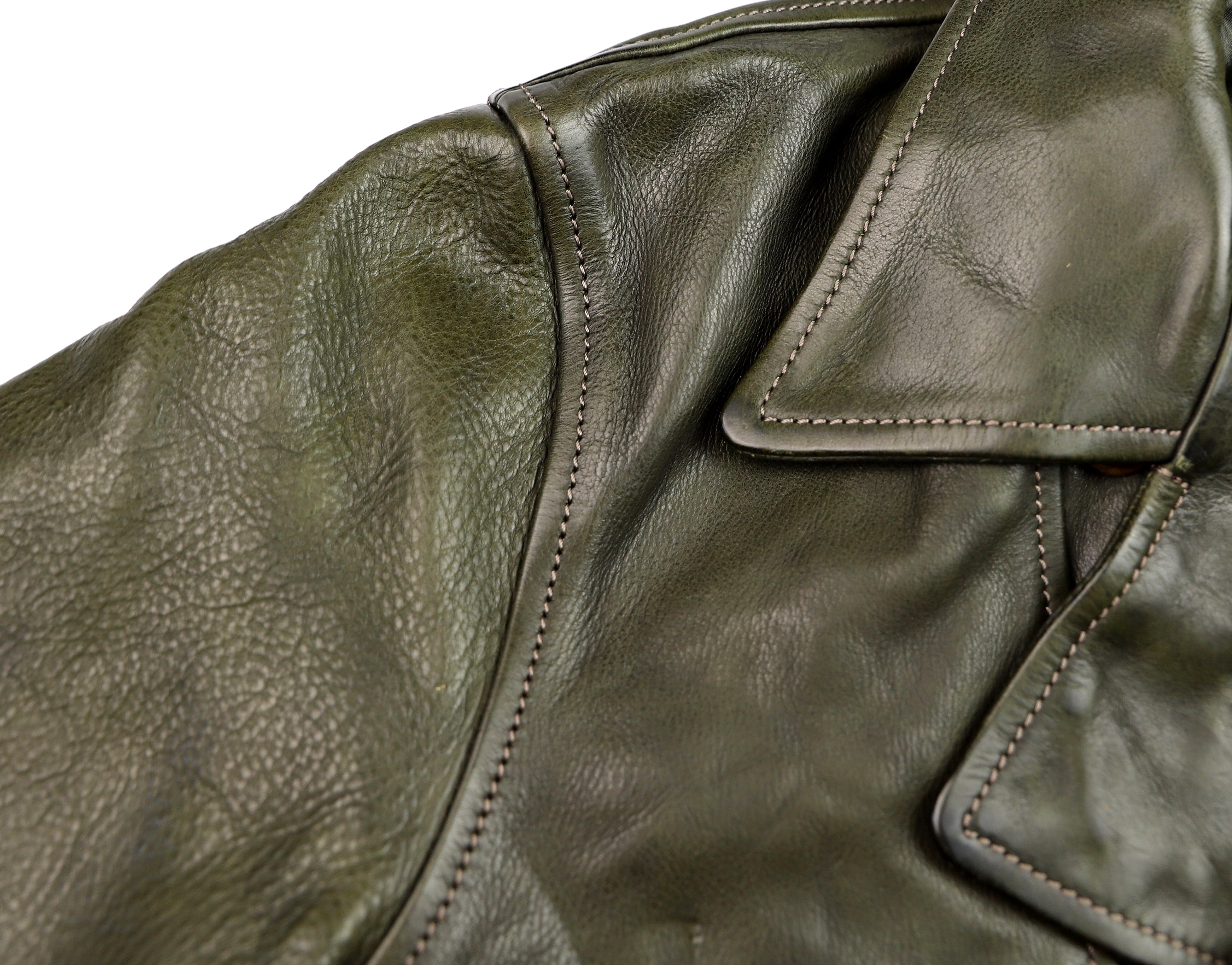 Thedi Hektor Green Cowhide shoulder seam.jpg